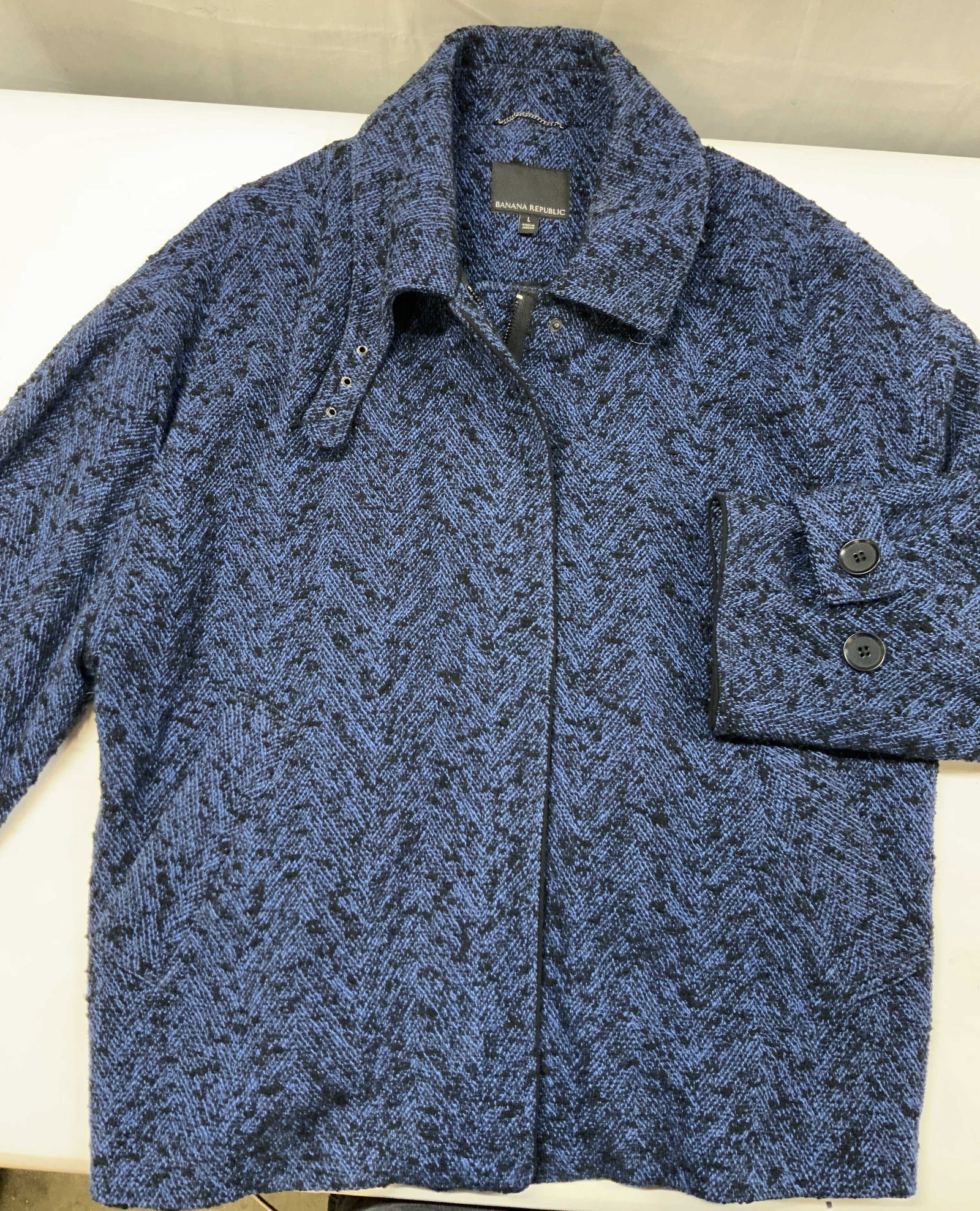 Vntg Banana Republic textured jacket, Jordan: Vintage Banana Republic textured jacket. Made in Jordan from a cotton polyester blend. Size large. It features a heavy multi tonal boucle textured knit weave. The pattern uses navy blue, royal blue,
