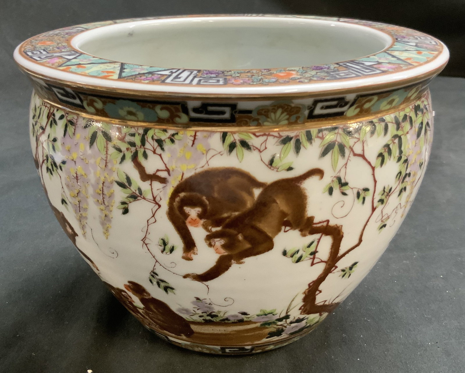 Vntg Chinese Export Porcelain Monkey Pot, Sgnd: Signed with Asian characters on underside, vintage Chinese Export Porcelain ceramic Cacheton pot featuring a hand painted monkey motif and wisteria tree motif, chinoiserie centerpiece bowl featuring t