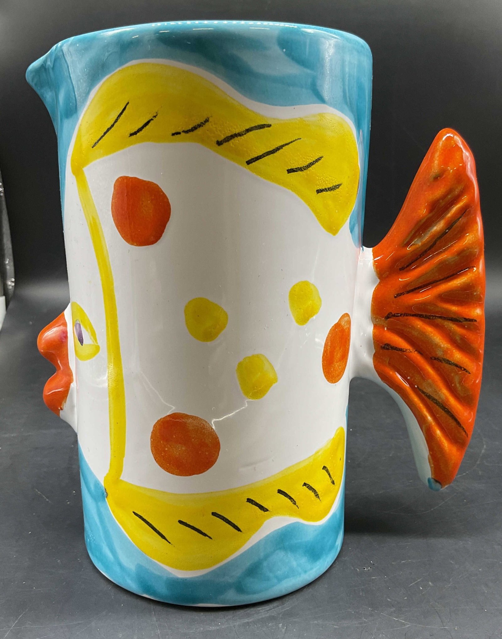 Vntg Whimsical Fish Ceramic Pitcher, Italy: Vintage Glazed Ceramic whimsical Fish Pitcher, marked on underside made in Italy exclusively for Macys, R.H. Macy and company inc, measures ht app 8 inches, diameter w fin app 7 inches