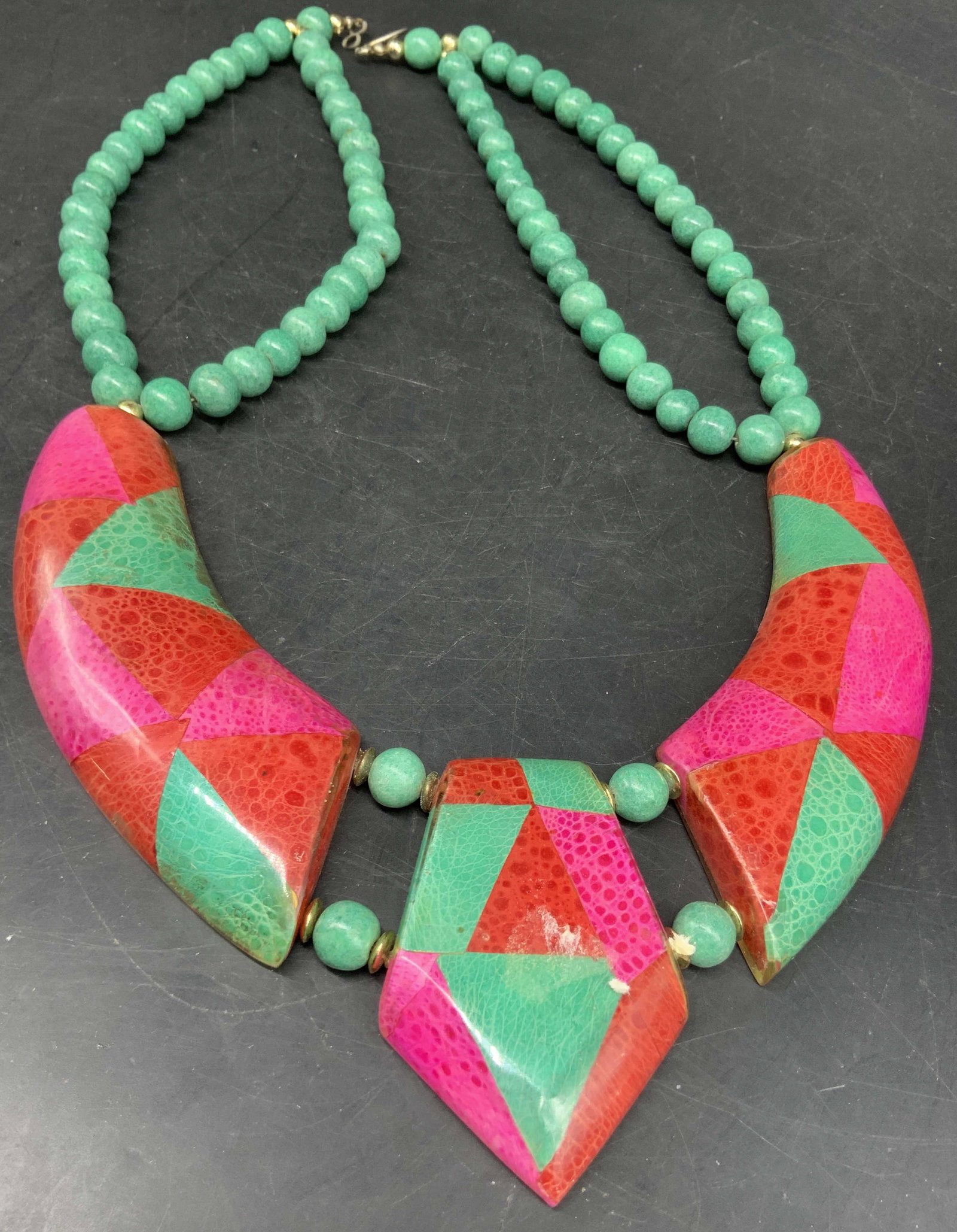 Vibrant Vintage Statement Pink Green Necklace: Vibrant vintage statement necklace features geometric inlaid pink, red , turquoise, and turquoise green celluloid panels accented with matching round green beads, measures drop length app 11 inches, w