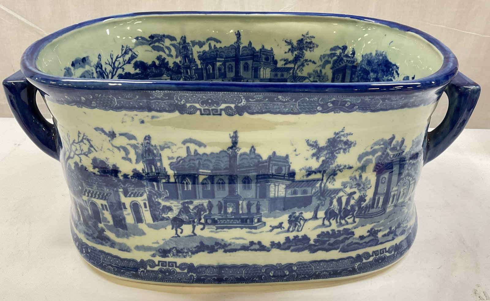 Victoria ware Ironstone Blue White Foot Bath: Vintage Victoria Ware Ironstone Blue and White Foot Bath, signed and trademarked with lions on underside, piece features a classic blue Transferware scenic motif and traditional side handles, heavy