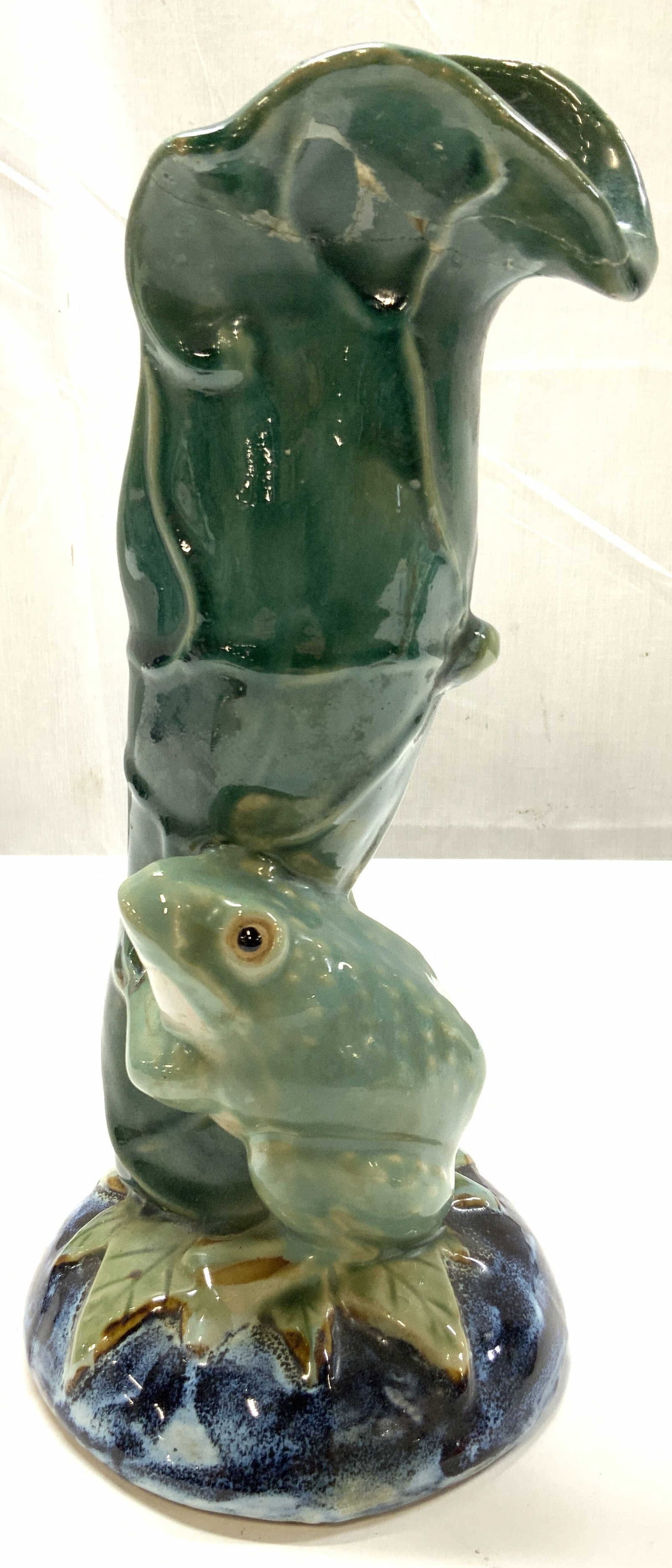 Majolica Style Vntg Ceramic Frog Vase Planter: Vintage majolica style ceramic frog vase planter, featuring an organic art nouveau inspired design where a glossy green frog sits at the base of a vertically stretched Calla Lilly or lotus leaf