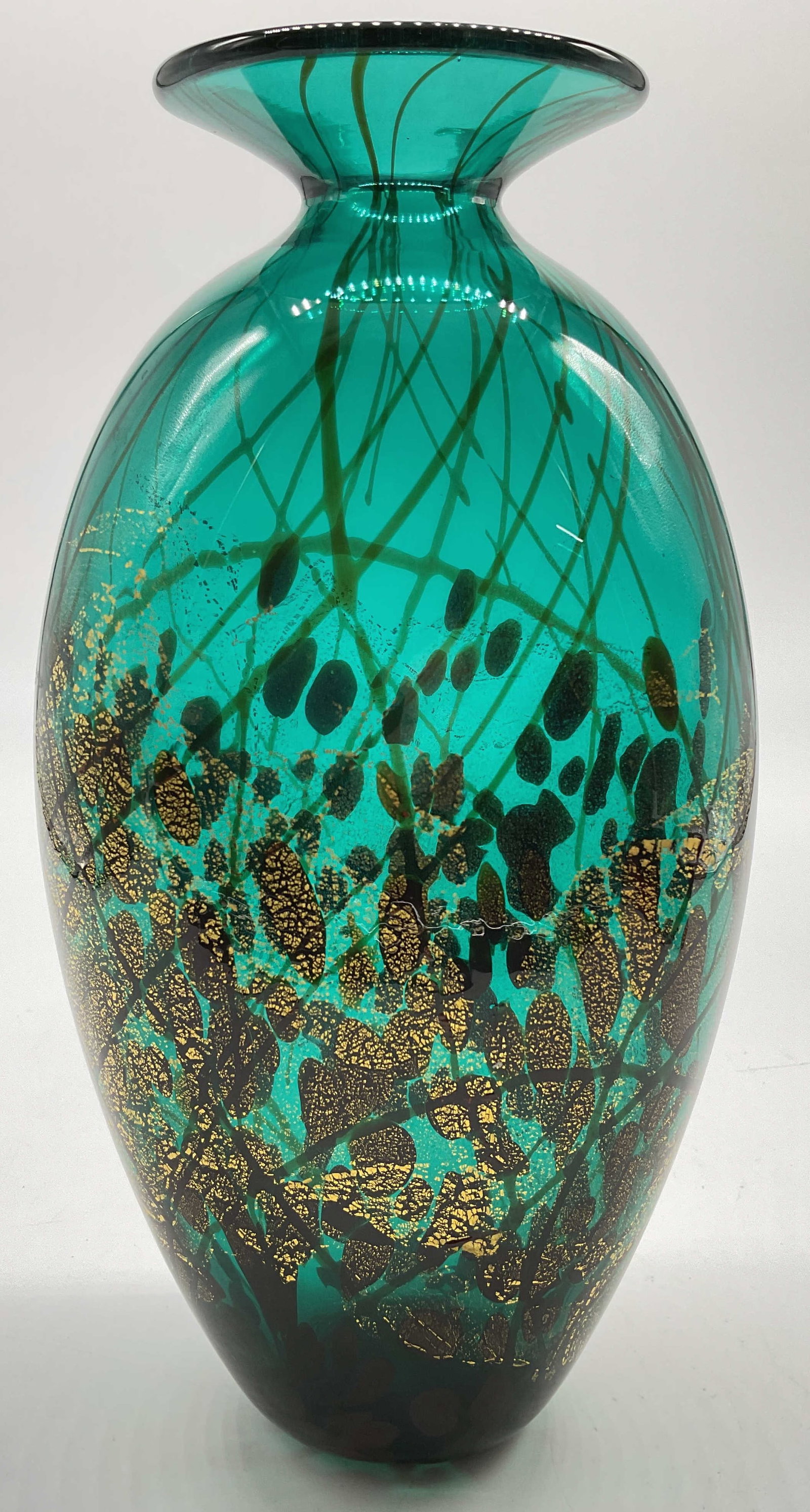 Signed Turquoise, Teal Gold Flecked Art Glass Vase: Signed dated and numbered on underside illegibly, handcrafted studio art glass vase featuring a rich turquoise and teal body decorated with metallic gold leaf inclusions , multi colored speckling and
