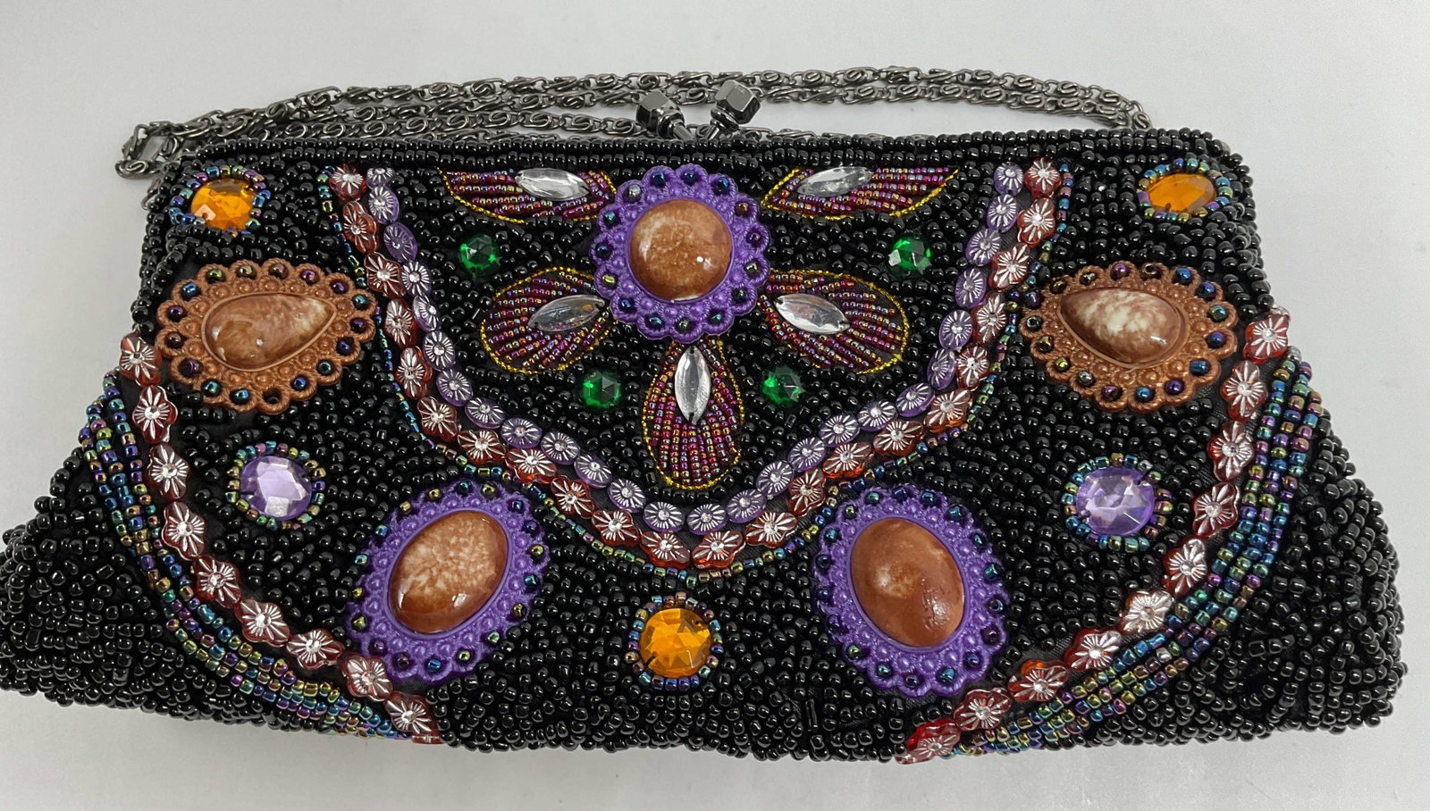 Marmi Evening Bag Gemstone, rhinestone,: Black evening clutch or shoulder bag, has chain, inside label for Marmi, features intricate glass bead embroidery accented with colorful faux gemstone cabochons and sparkling rhinestones, bag