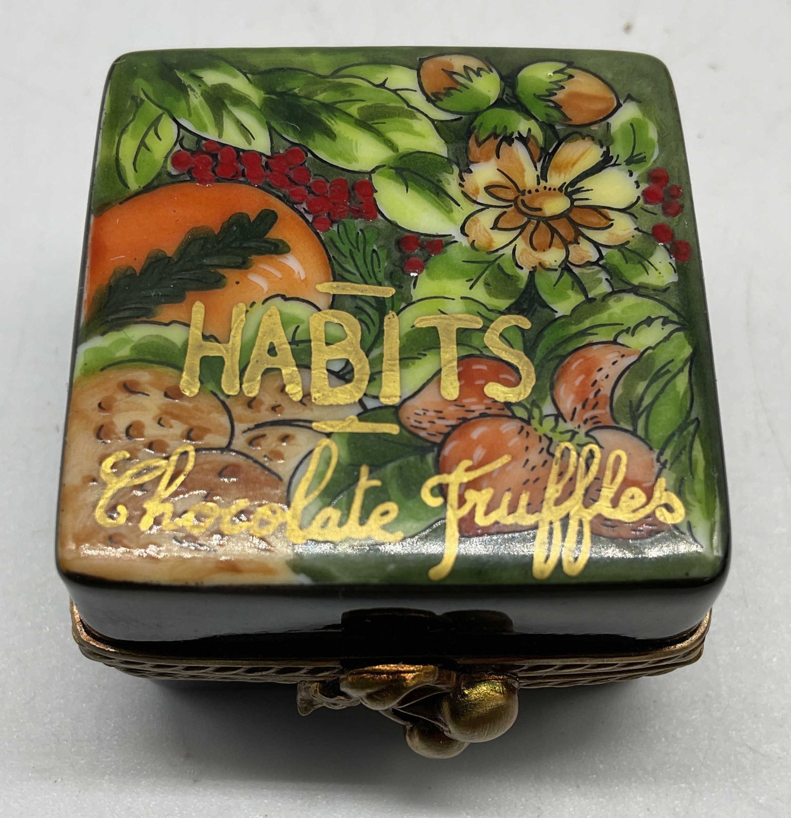 Limoges France Truffle Pill Box w Chocolates: Limoges France, ROCHARD, hand painted porcelain pill box , exterior has vibrant pattern and reads Habits, Chocolate Truffles in gold script, gold tone framing and hinged lid, box opens to reveal four
