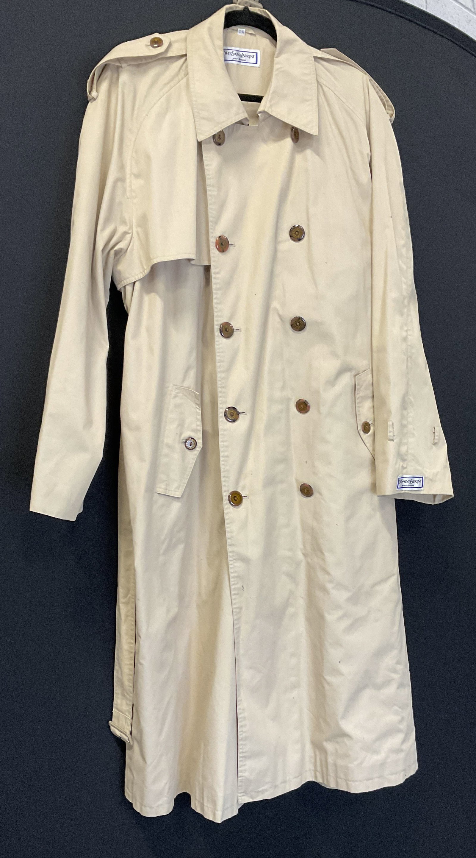 Vintage Yves Saint Laurent Pour Homme Trench Coat: Vintage Yves Saint Laurent Pour Homme Beige Trench Coat. Polyester and Cotton Blend. Condition Consistent with Exposure. Size 42 US/52 EU. Vintage Trench Coat, Yves Saint Laurent Pour Homme, Beige Tre