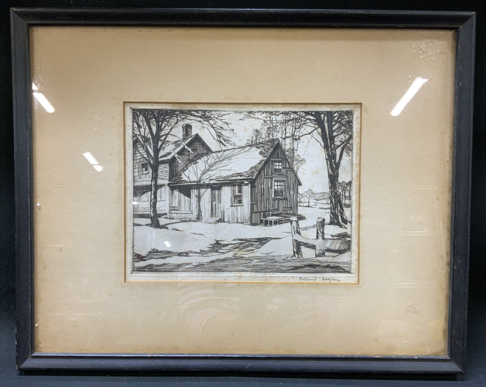 1939 Sgnd Roland Logan Winter Etching, Framed: 1939 Signed Roland Kickapoo Logan Etching titled Winter Framed. Depicts landscape with rustic weathered wooden farmhouse tucked behind winter toned trees. Rendered with intaglio etching and some Drypo