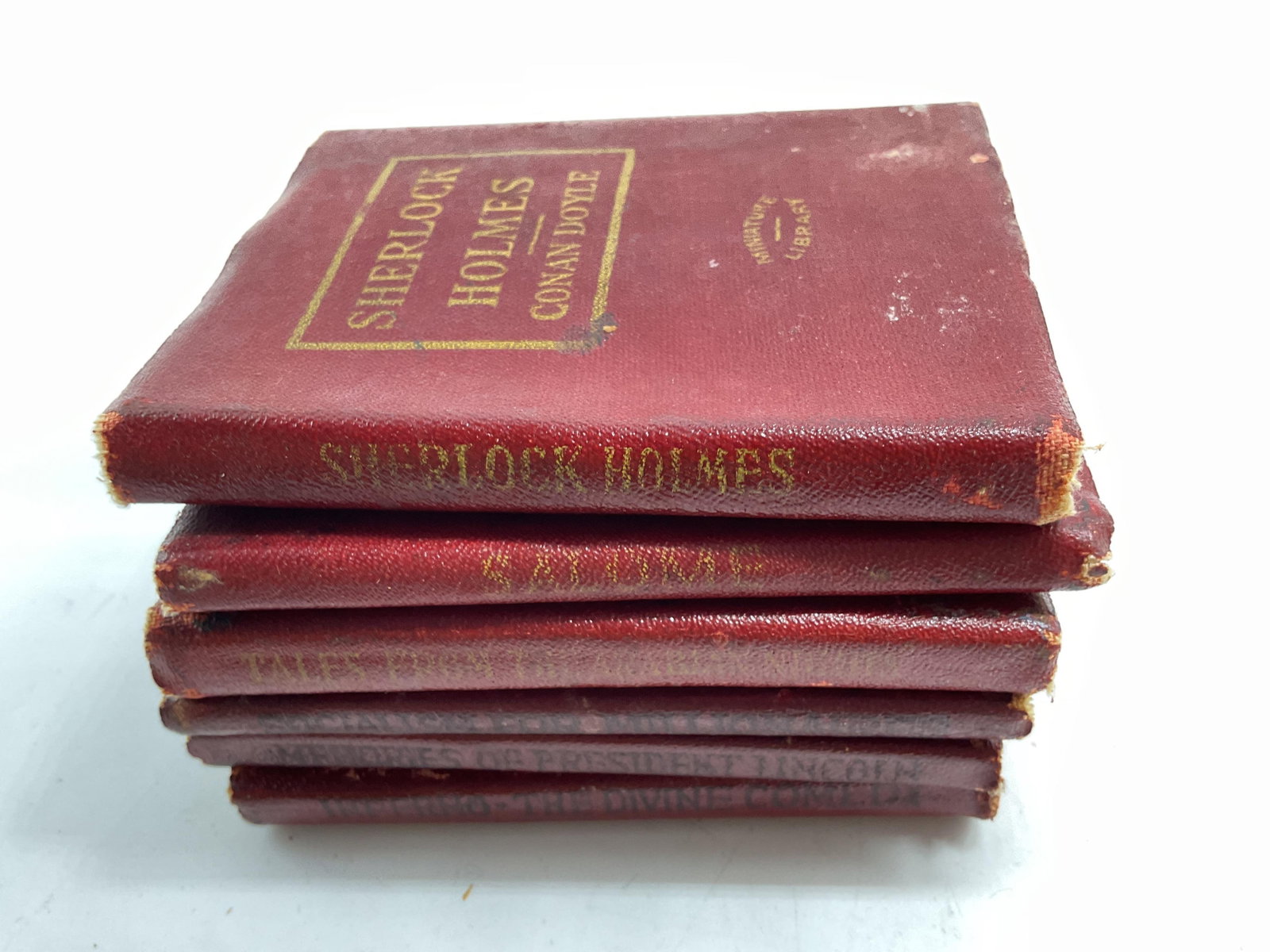 Antq Set 6 Mini Leather Books C1920: Set of 6 mini leather books published by the Little Leather Library Corporation C 1920s4 by 3.5 inches, New York, USA, and includes Sherlock Holmes, Salome by Oscar Wilde, Tales from the Arabian Night