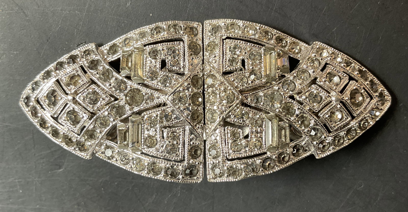 Vntg Coro Duette Sgn Art Deco Rhinestone Clip: Vintage Art Deco Signed Coro Duette With multiple patent numbers verso, features a convertible design with two detachable dress clips locked into a central frame , design consists of an open work geom
