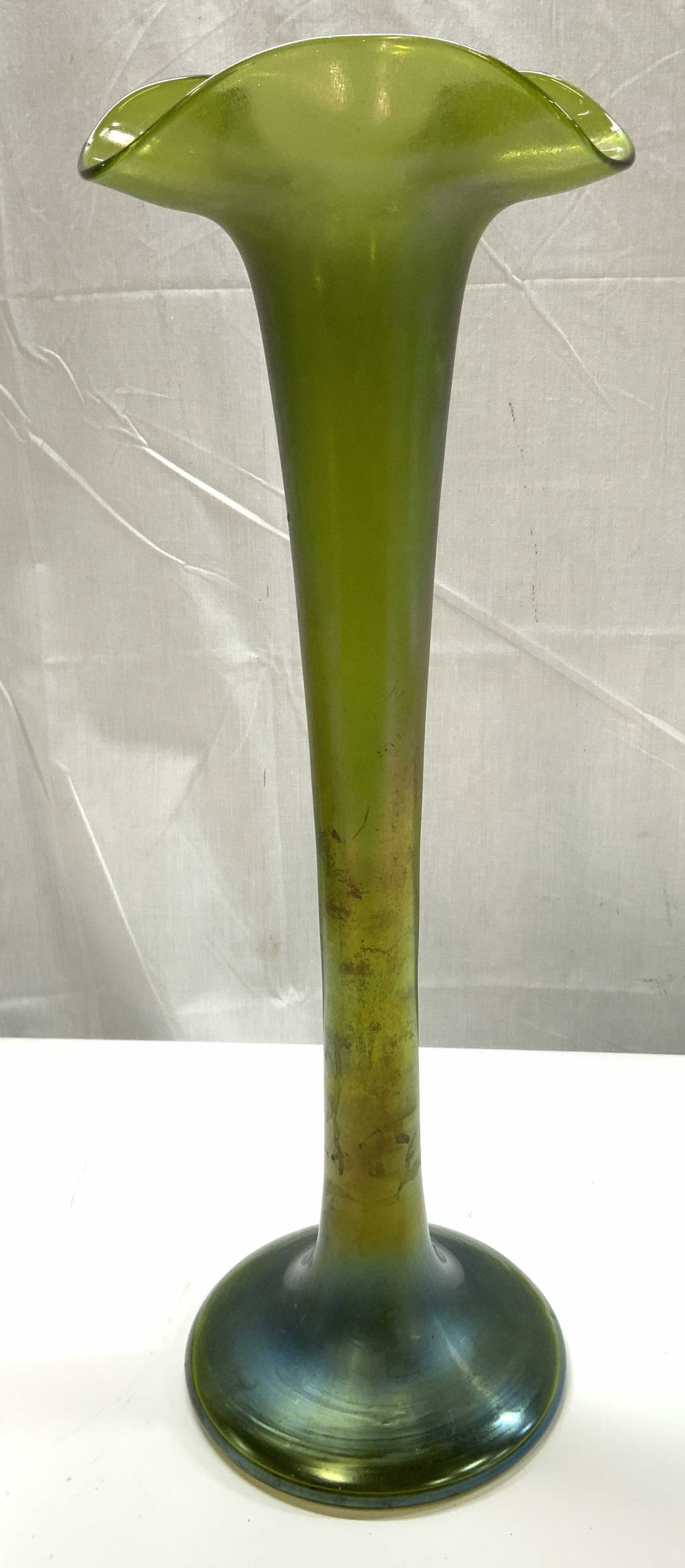 Antq Iridescent Green Art Glass jack in Pulp Vase: Antique Iridescent green art glass vase, in the style of Loetz Delphi, jack in the pulpit featuring a classic flared ruffled rim and a lustrous iridescent vase, measures ht app 20 inches diameter app