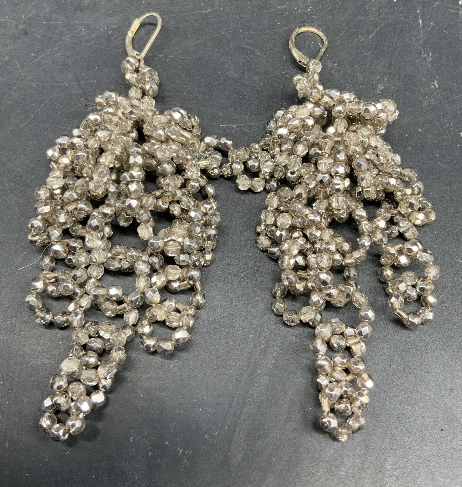 Sterling Crystal Multi Strand Cluster Earrings: Sterling silver and multi strand crystal cluster dangle earrings, each piece has chain link circles of sterling and crystal in multiple strands for a Statement and layered design, drop length app 4