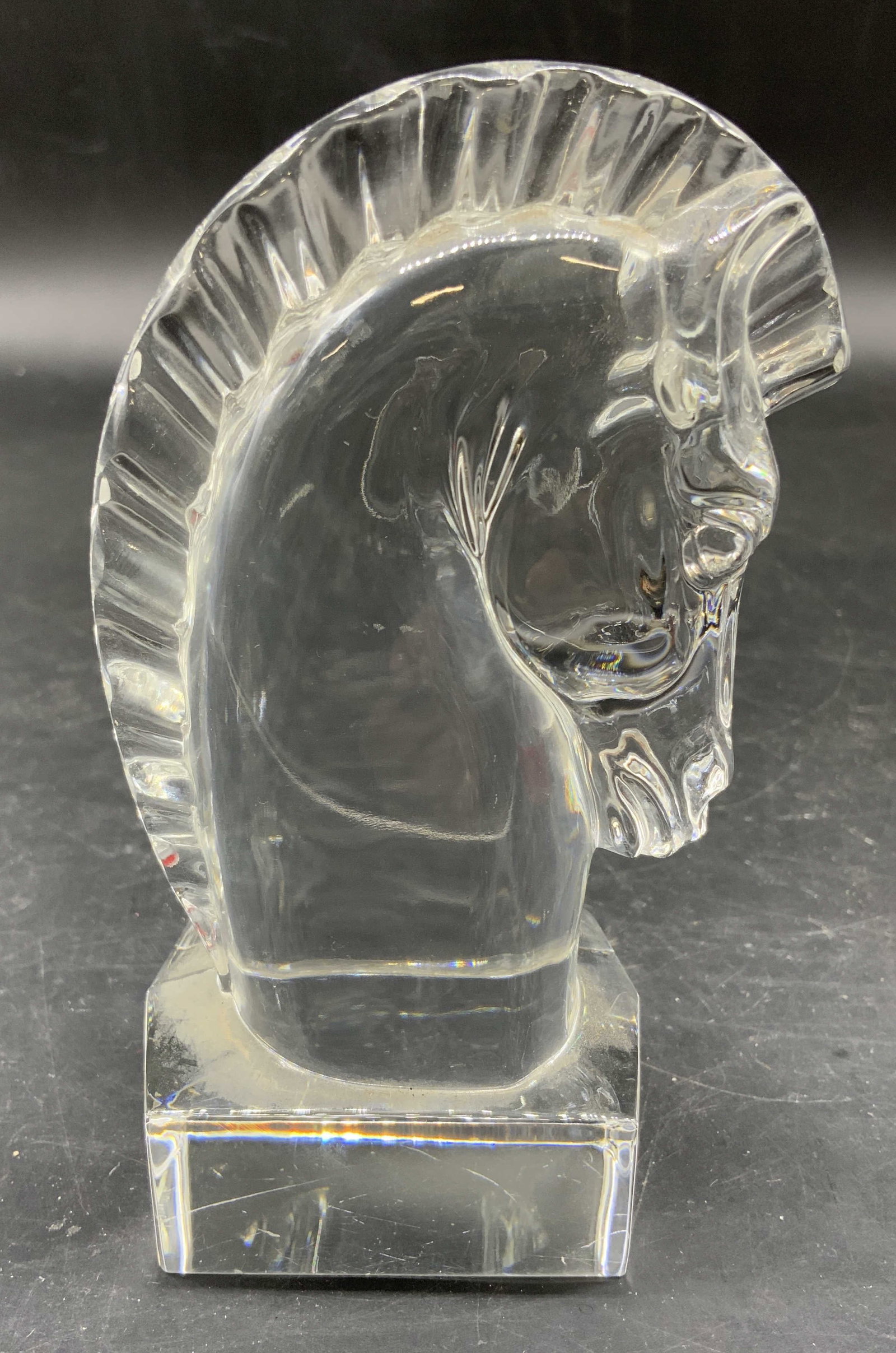 Sgnd Steuben Solid Crystal Horse Head: Signed Steuben solid crystal gorse head figural on shaped base, sculpture, paperweight, vintage Steuben, a stylized elegant equine head featuring a deeply cut fluted mane and rectangular base, hand si