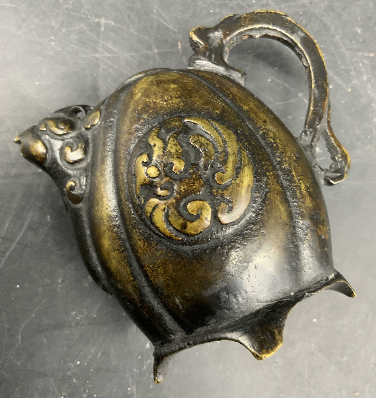 Antique Japanese Bronze Water Dropper: Antique Japanese Bronze water dropper, SUITEKI with a melon shaped body, a raised gilt dragon rondel on the side, and a bird shaped spout, and a stylized Phoenix tail ornate handle, scholars desk