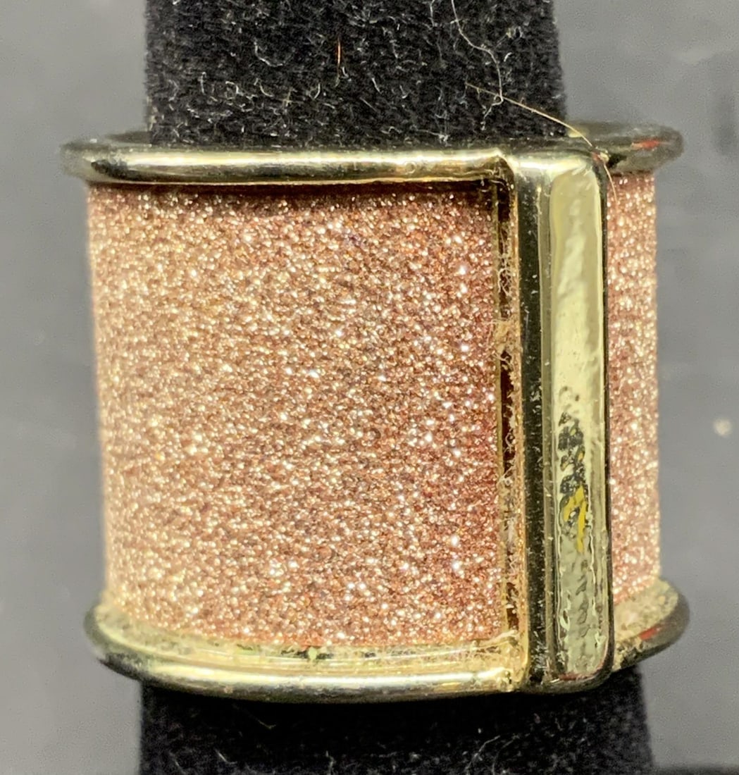 Vntg Shimmering Rose Gold Tn Band Ring: Vintage wide band gold toned textured skin ring accented with shimmering textured rose gold tone central band, width app .75 inches, estate jewelry -j