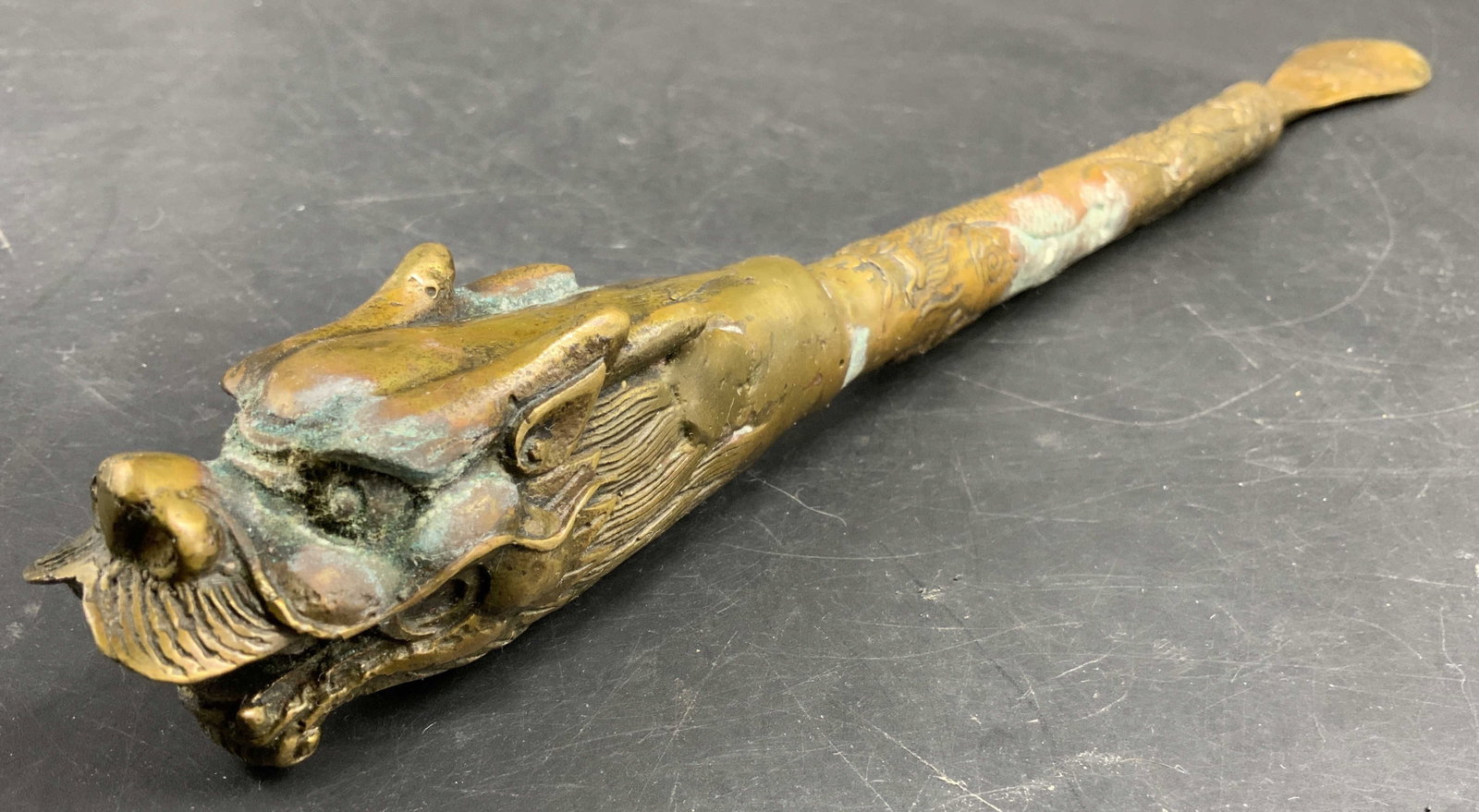 Antq Gilt Bronze Dragon Loong Shoe Horn 14in: Antique or vintage Loong, dragon head shoe horn tested with XRF Analyzer as bronze, features an ornate dragon head intricately carved body textured scales feet and tail, with flatter shoe horn with