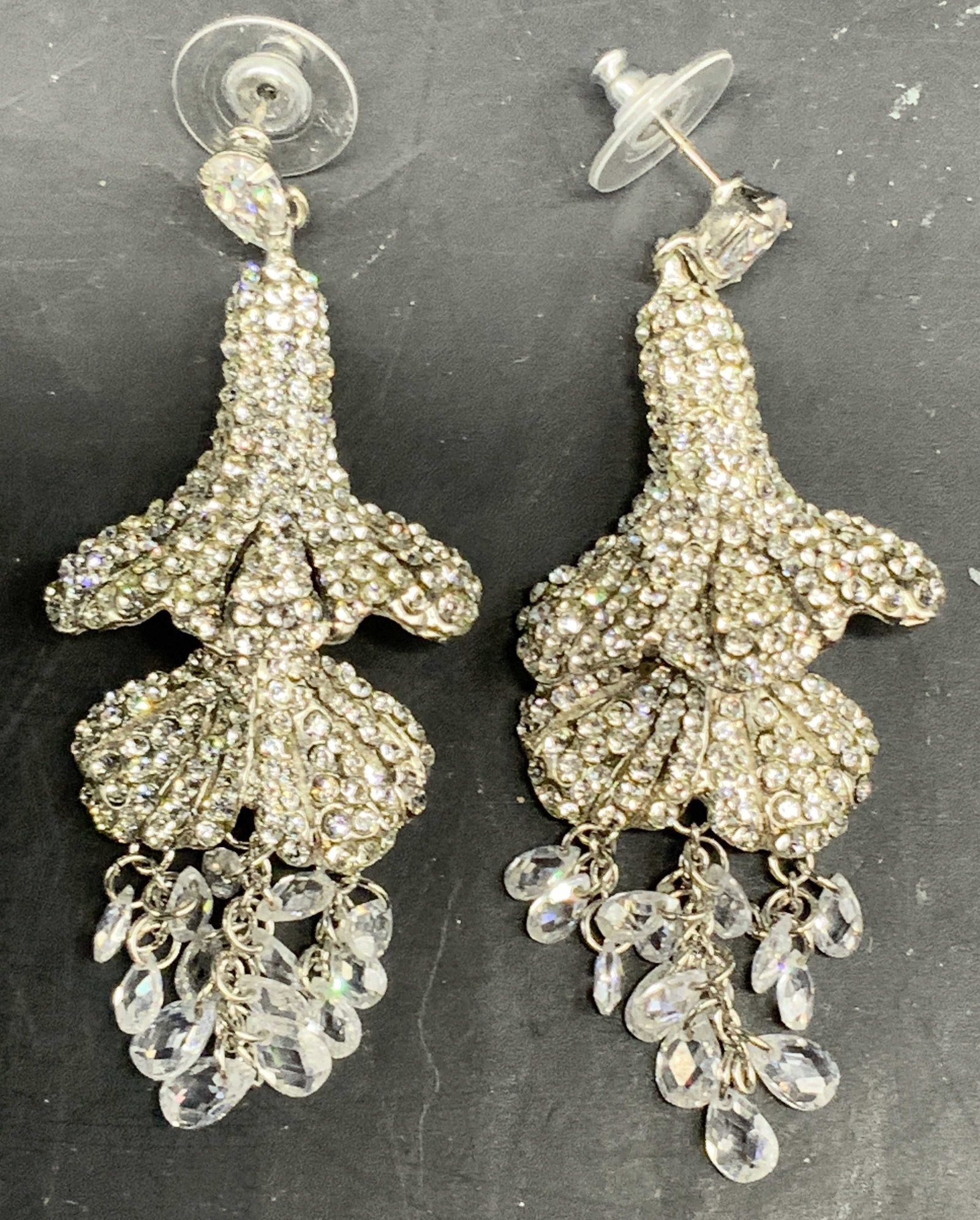 SIMAN Tu Sgnd Crystal Chandelier Drop Earrings: Signed by NY luxury fashion jewelry designer SIMAN Tu, crystal pave Statement earrings drop length app 3.25 inches, designed in a tiered trumpet flower silhouette, they feature a two layered textured 