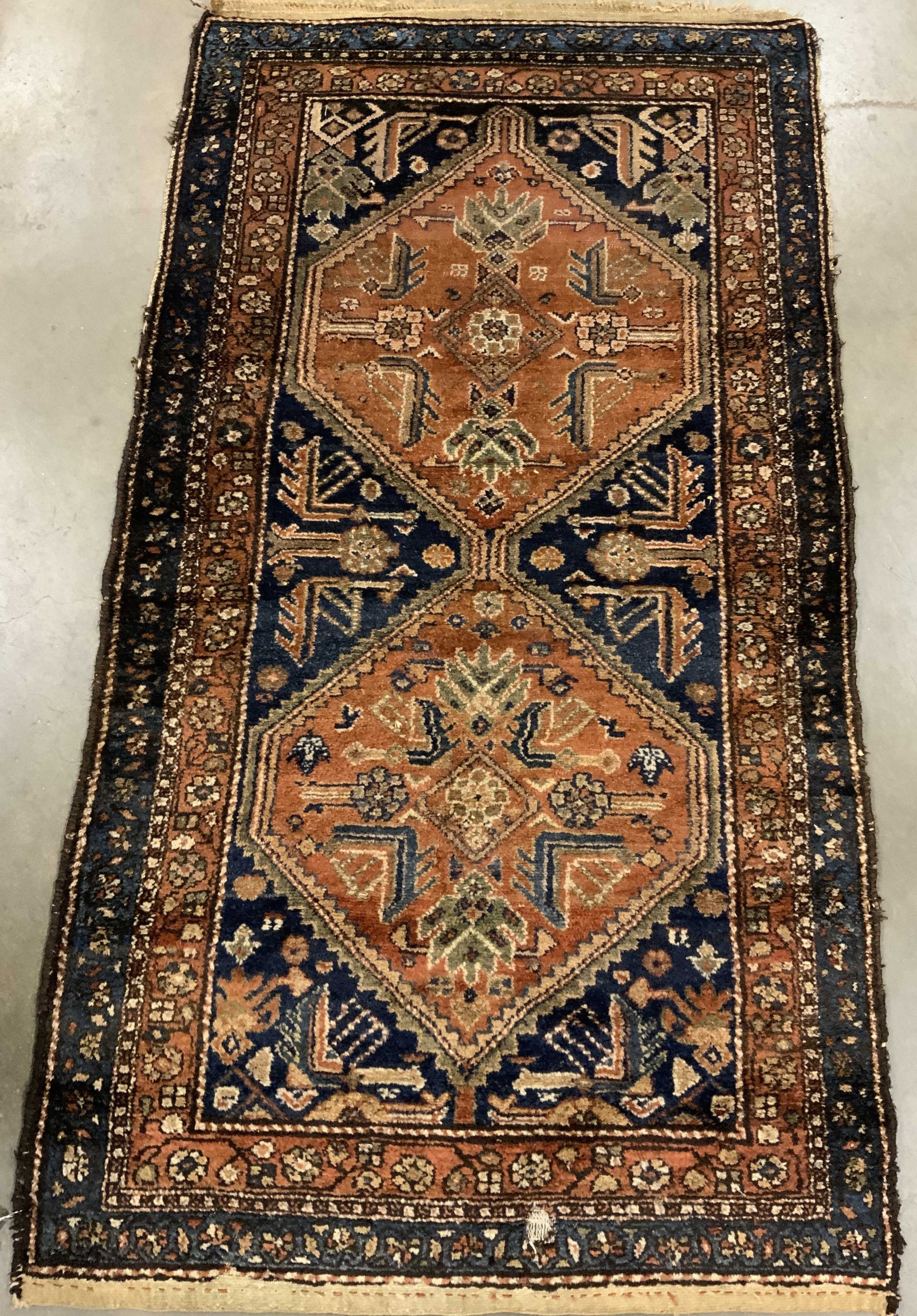 Antq Persian MALAYER Wool Rug: Antique Persian Malayer Wool Rug characterized by dual hexagonal medallions nesting inside co trashing diamond reserves , midnight blue field, has wear and some color fading measures 72 by 38 inches