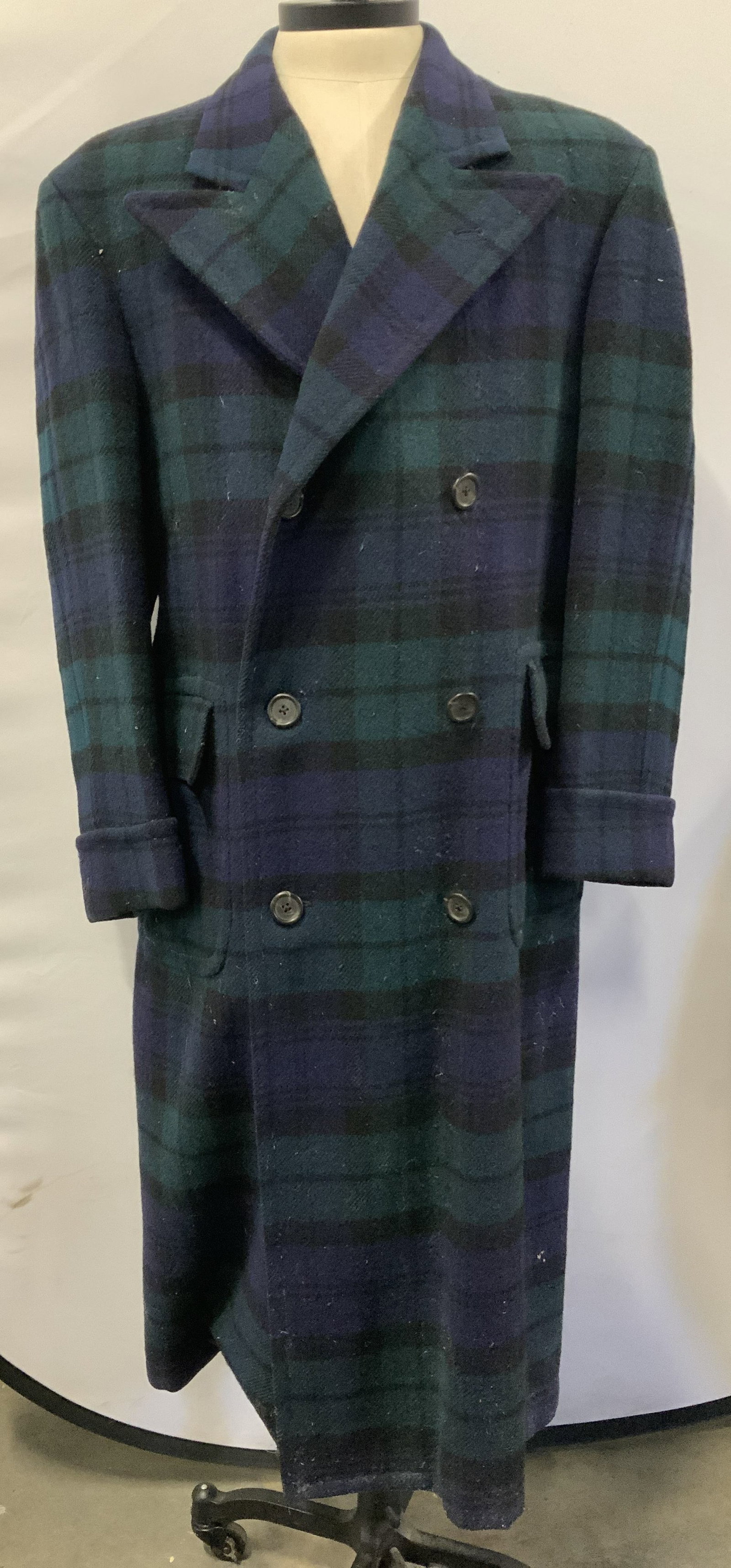 Vntg Ralph Lauren long plaid coat, USA: Vintage Ralph Lauren long plaid coat. Made in the USA. Designed in classic black watch tartan plaid made up of green, navy blue and black. the classic double breasted button front layout offers excell
