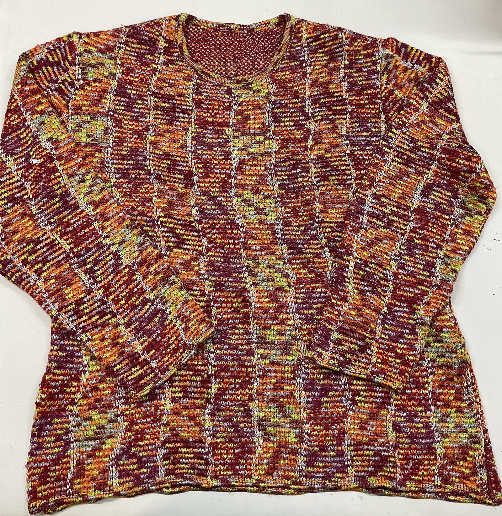 Vntg MISSONI SPORT sweater , Italy: Vintage MISSONI SPORT sweater. Made in Italy using a rayon viscose blend. The threads were made using a space dyed gradient. They shift dynamically between yellow, orange , and magenta creating a rand