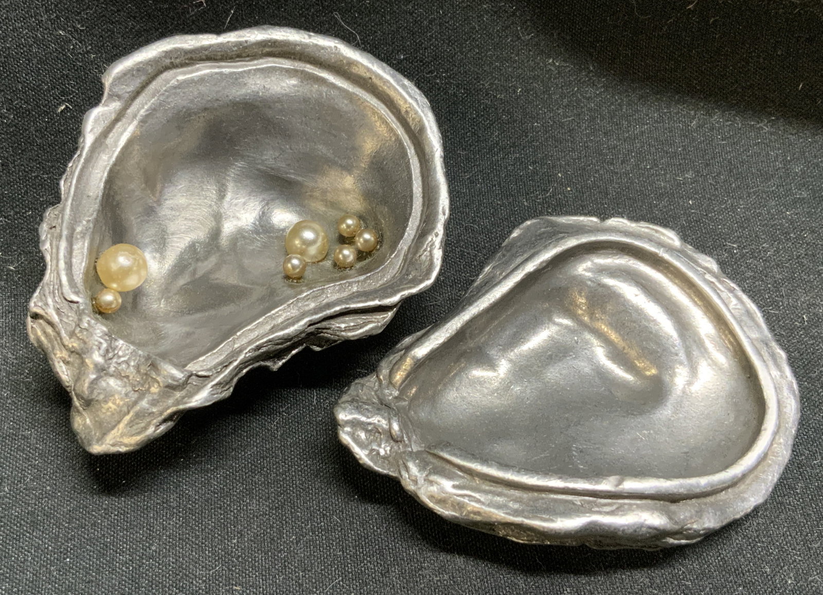 Sgnd Michaud Table Art Pewter Oyster Shell Box USA: Signed Michael Michaud Table Art Pewter Oyster Shell Trinket Box. USA. Small glass faux pearls cluster-fused into one half of the shell. Realistic textured oyster shell designs. Condition consistent w