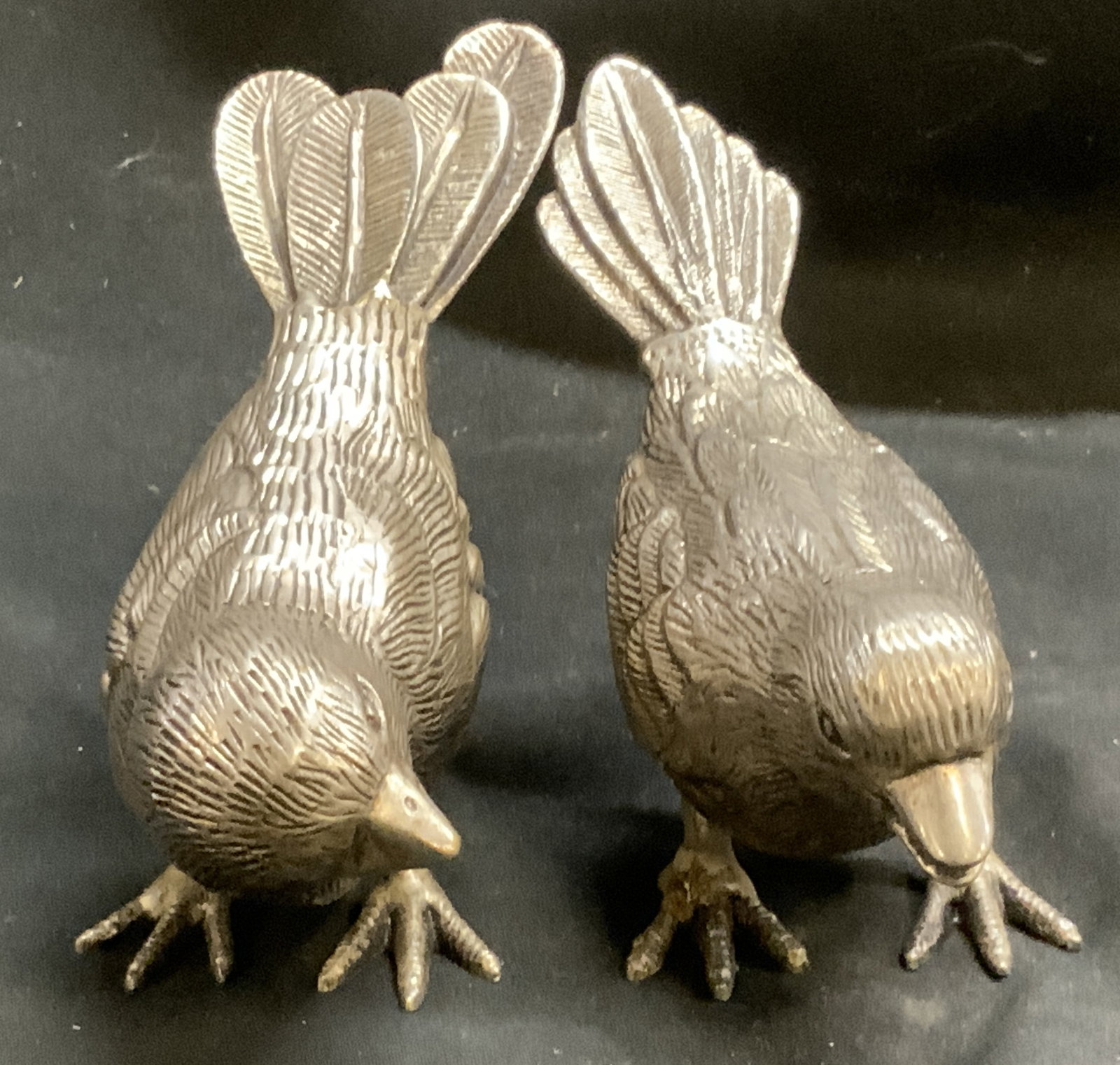 Vtg Silver-Plated Bird Salt & Pepper Shakers: Vintage Silver-Plated Brass Bird Salt and Pepper Shakers. Realistic textured layered feathers, detailed clawed feet, and defined tail plumes. Marker inscriptions on base. Previous repair on foot of on