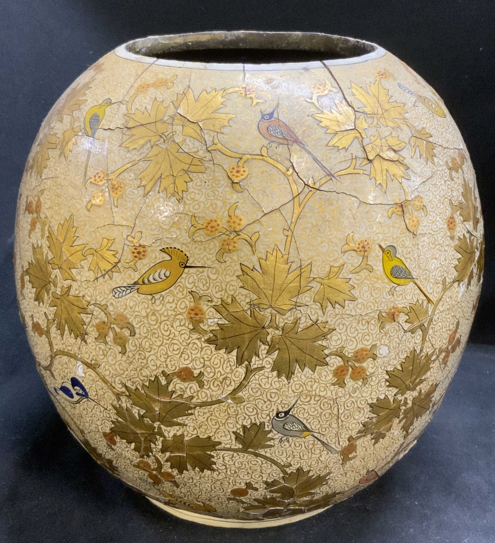 Authentic Stamped Indian Artisan Lacquerware Vase: Authentic Stamped Indian Artisan Lacquerware Vase. Hand-Painted colorful birds and gilt maple leaves. Sticker on bottom translates to Khadi Gramodyog Sangh Director/Manager. Khadi and Village Industri