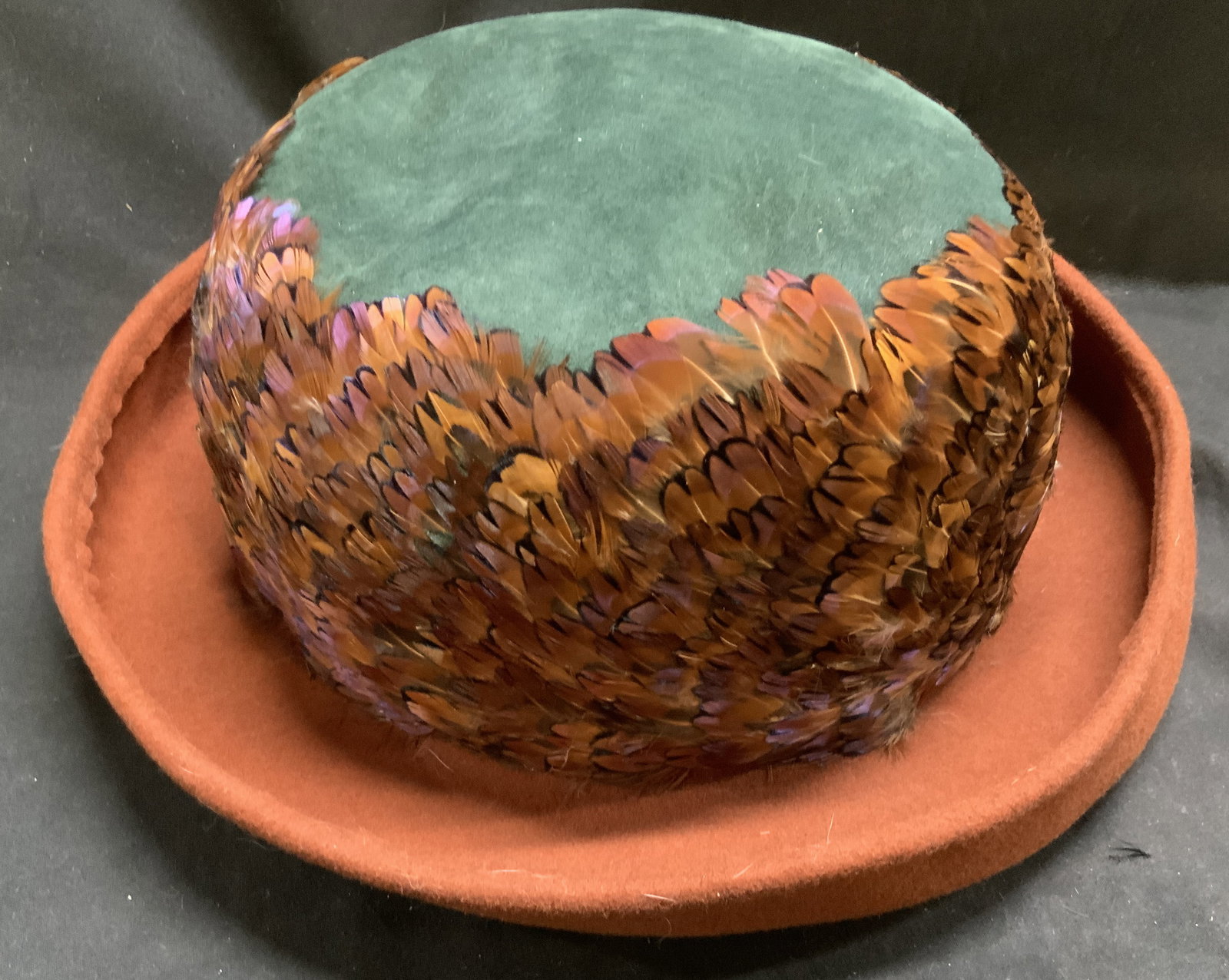 Vtg Whittall & Shon Wool and Pheasant Feather Hat: Vintage Circa 1970s-1990s Whittall & Shon 100% Wool Felt and Pheasant Feather Hat. Green and brown. Blocked using premium blank from Bollman Hat Company. Some wear to padding inside. Measures app 7.5i