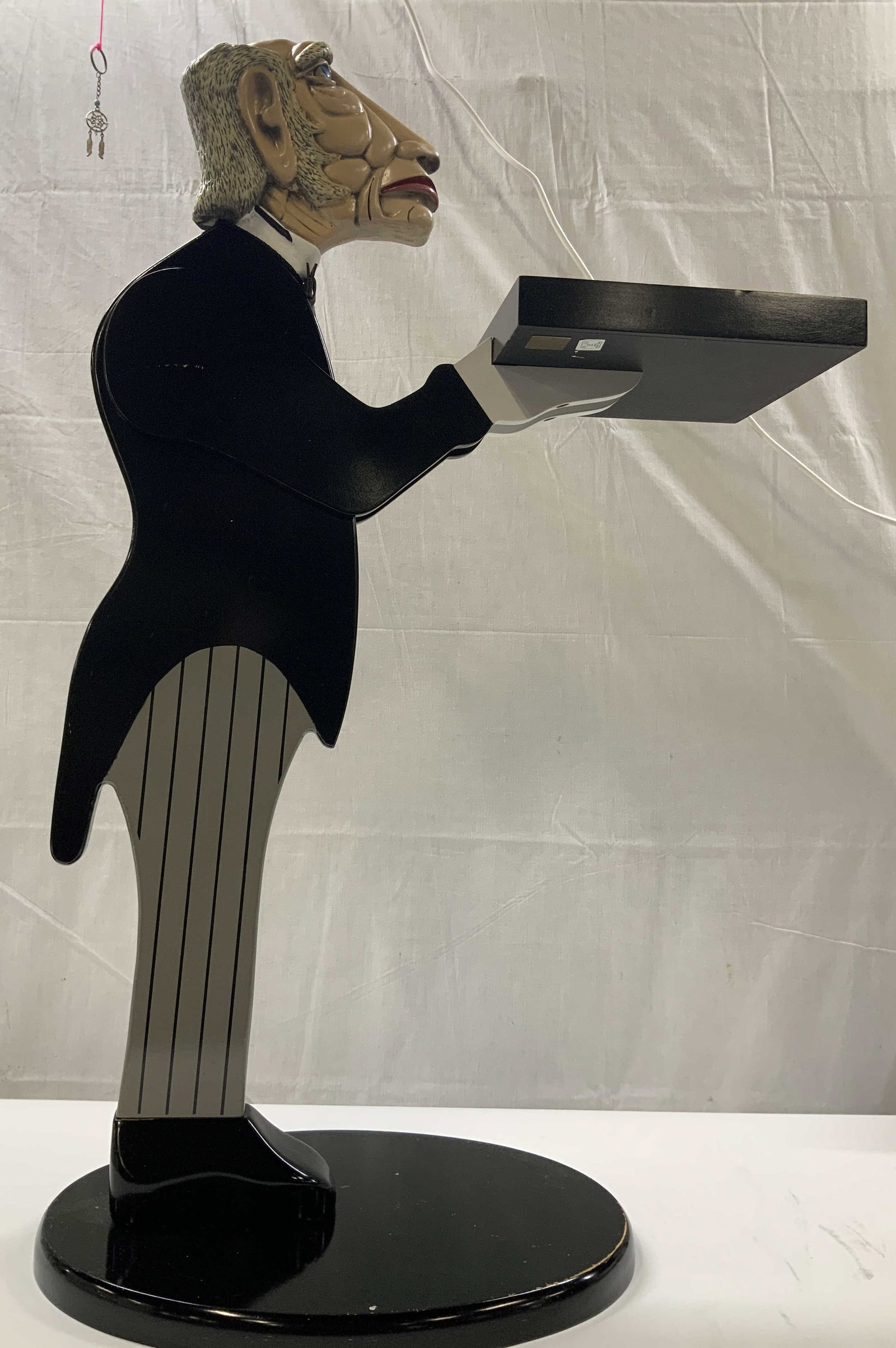 Vntg Bombay Company James the Butler serving tray: Vintage Bombay Company James the Butler serving tray. Made of poly resin released in the 1990s. James is sharply dressed in a painted formal tuxedo, complete with white gloves and pinstripe trousers. 