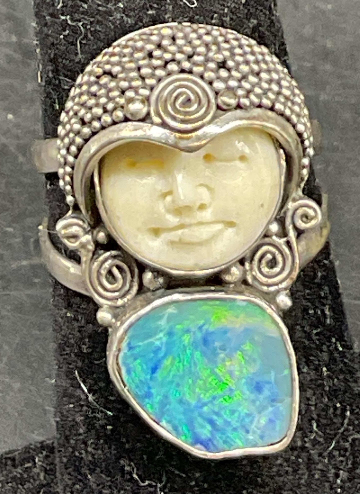 Vtg Sterling Silver Semiprec Face Cocktail Ring: Vintage sterling silver semiprecious gemstone face cocktail ring. Surface marked 925. Blue and white carved face semiprecious gemstones. Tested with Presidium Gem Tester II. Beaded and swirl accents.