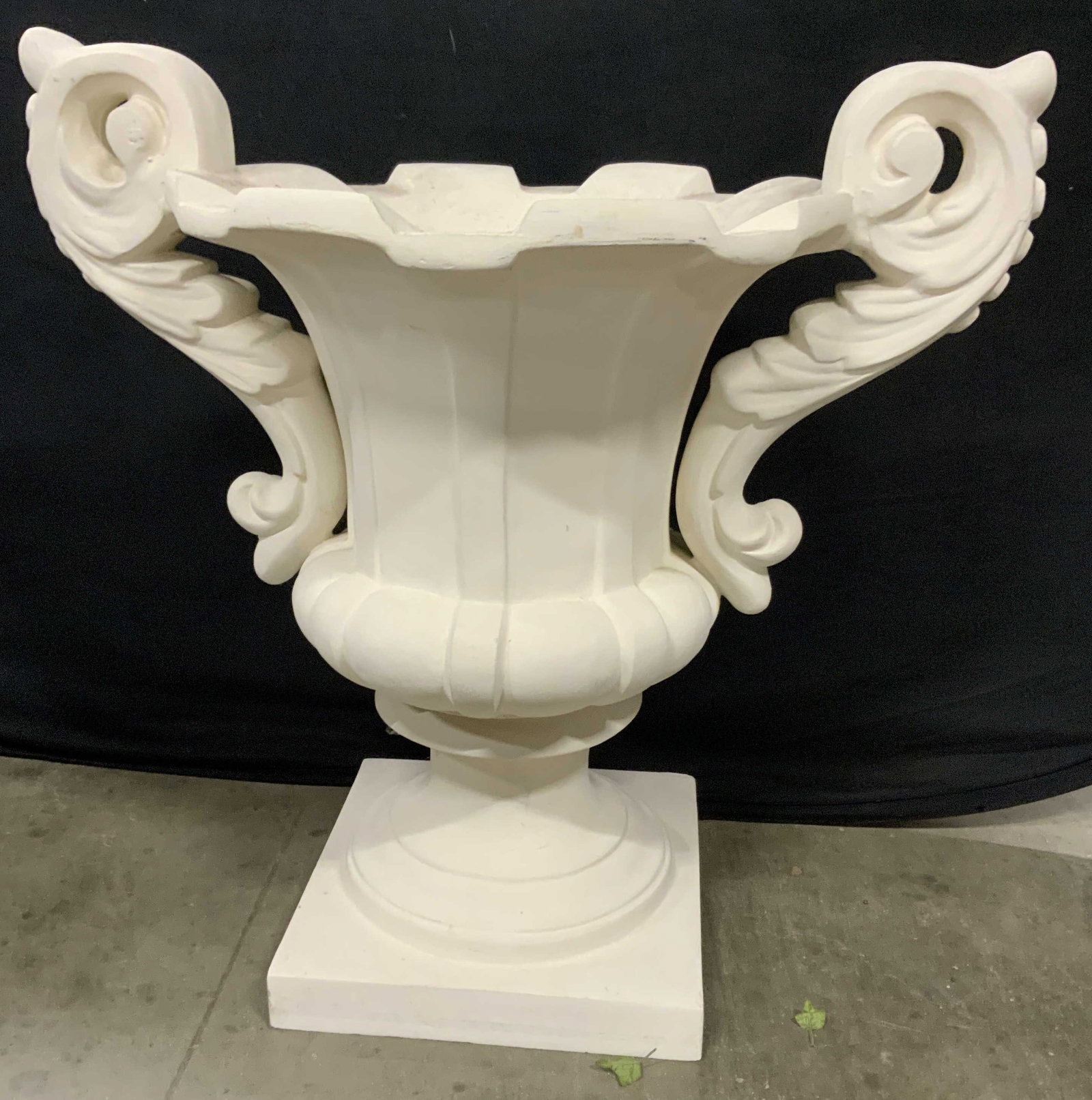 Classical White Faux Stone Garden Urn: Classical white Urn Planter in lightweight composite material, featuring ornate s roll handles and a fluted bowl design, measures ht 29 inches, diameter 29 inches to handle ends, possibly fiber glass