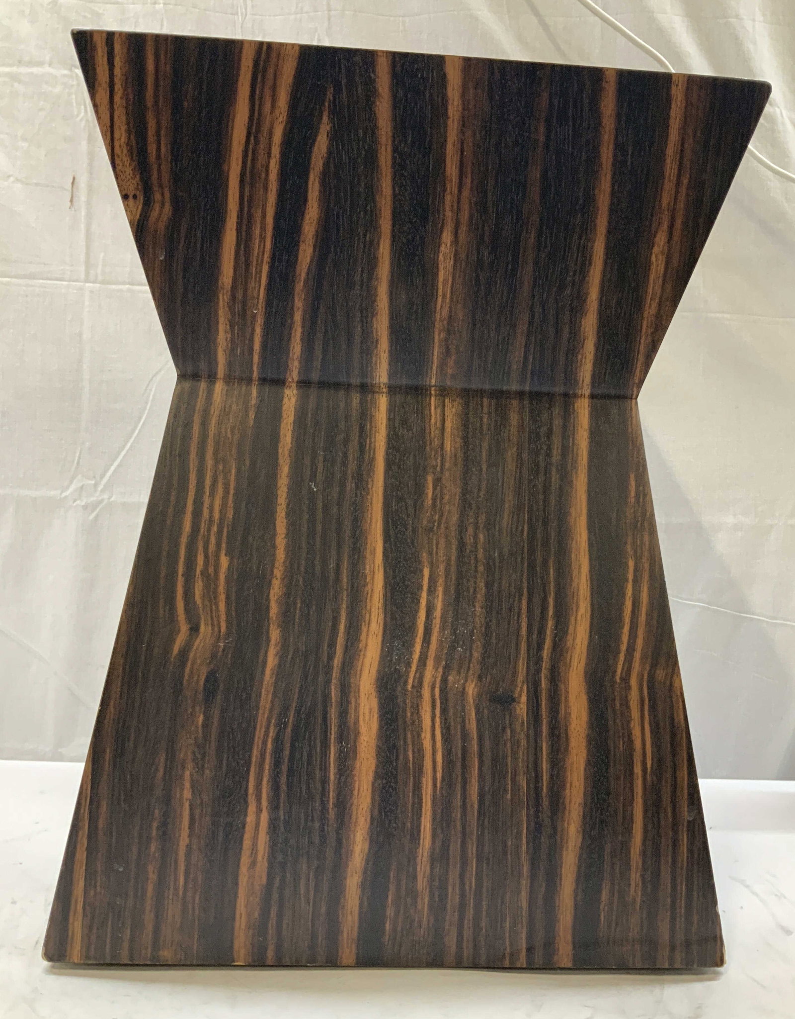 GUS DESIGN GROUP Macassar ebony side table: GUS DESIGN GROUP Macassar ebony side table. Features a distinctive hourglass form utilizing vertical Macassar style stripes. The alternating light and dark stripes fallow the sharp angular slopes of t