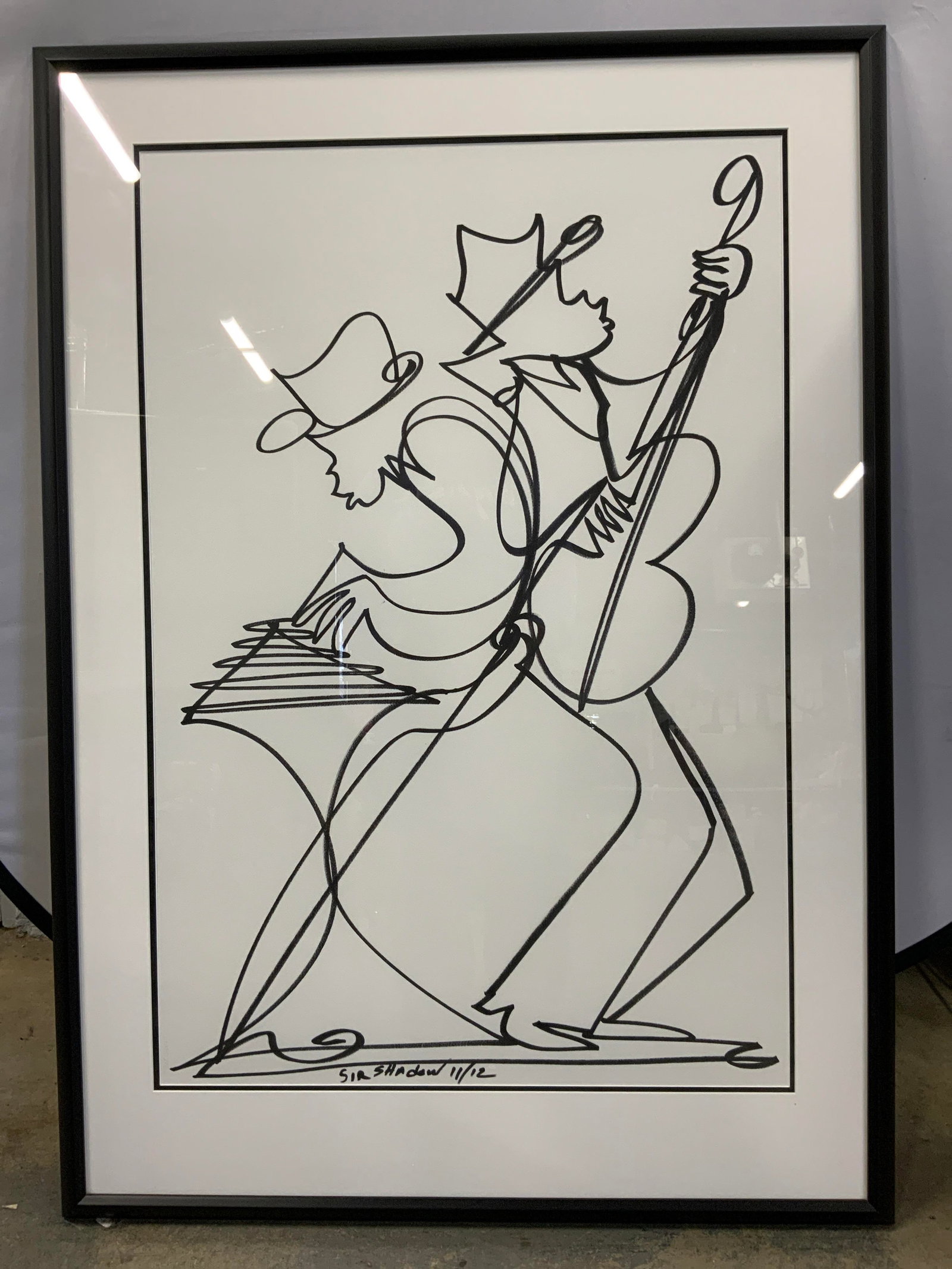Vtg Sgnd Sir Shadow Drawing Framed: Vintage Sir Shadow untitled jazz duo drawing on paper. Signed Sir Shadow, dated or Editioned 11/12. Black marker continuous one-line minimalist fine art. Frame, surface wear to frame, professionally