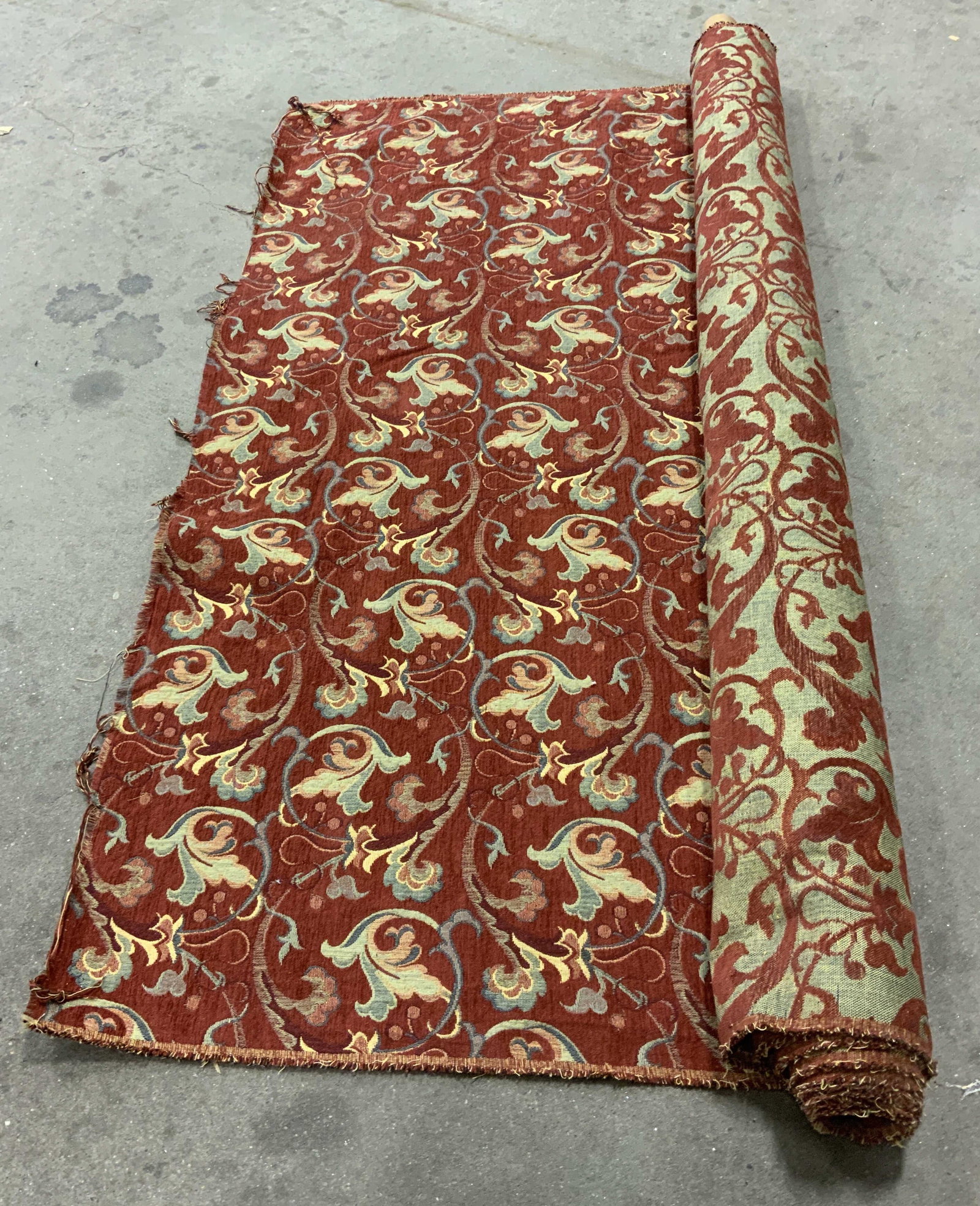 Floral Vine Damask Patterned Fabric Bolt: Floral Vine Damask Patterned Fabric Bolt. Cream, sage, and blue tones on red background. Linen and cotton material. Red velvet texture on pattern. Not unrolled, measured, or inspected. florals, vines,