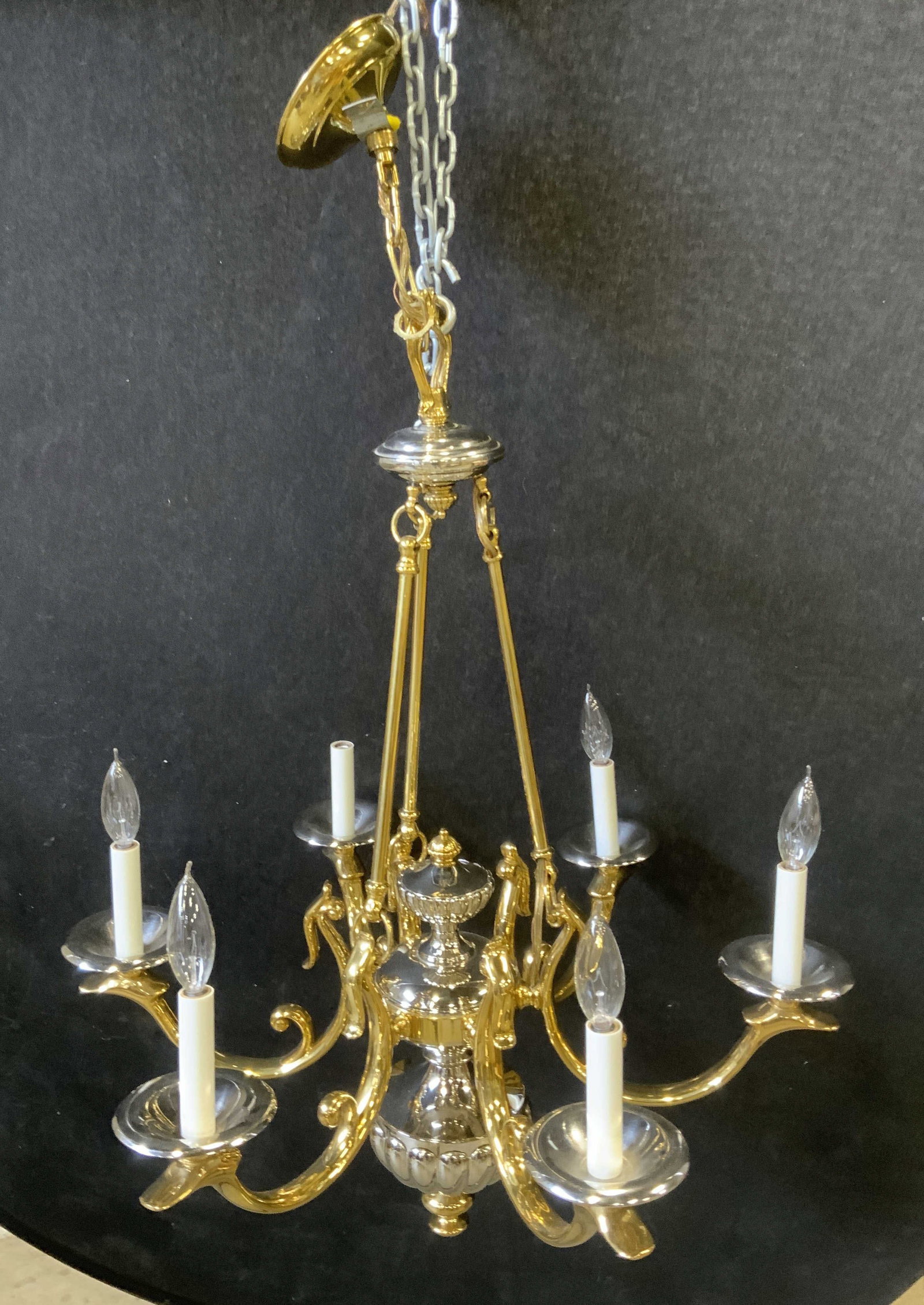 Vtg European Style 6-Light Dual Tone Chandelier: Vintage Circa 1970s-1980s 6-Light Dual Tone Chandelier. European Style design. Gold-Toned polished brass paired with silver-toned finish. Baluster-Shaped central spindle with scrolled arms. Scratching