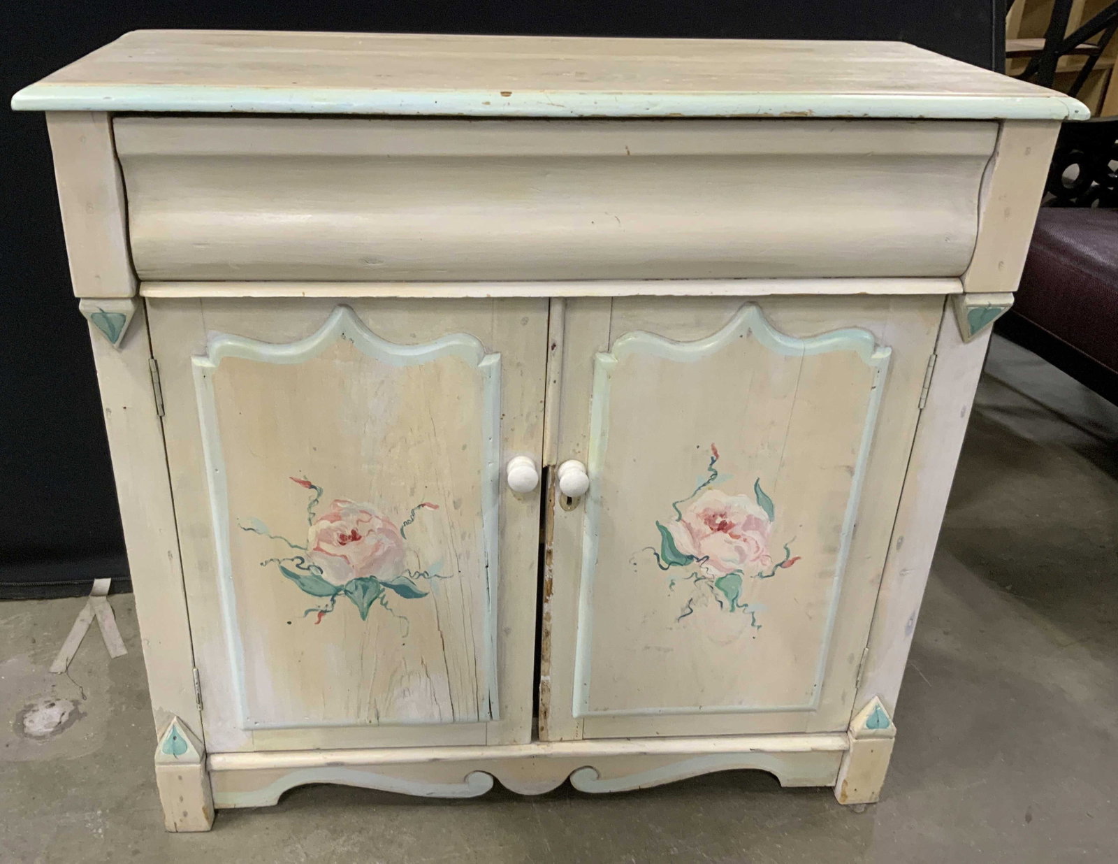 Hand Painted Wooden Floral Cabinet Dresser: Hand painted antique wood furniture, piece fas ogee edges to top, curved drawer and two door cabinet which opens to two shelves cream tone with pale green accent trim, and rose with leaves cabinet doo