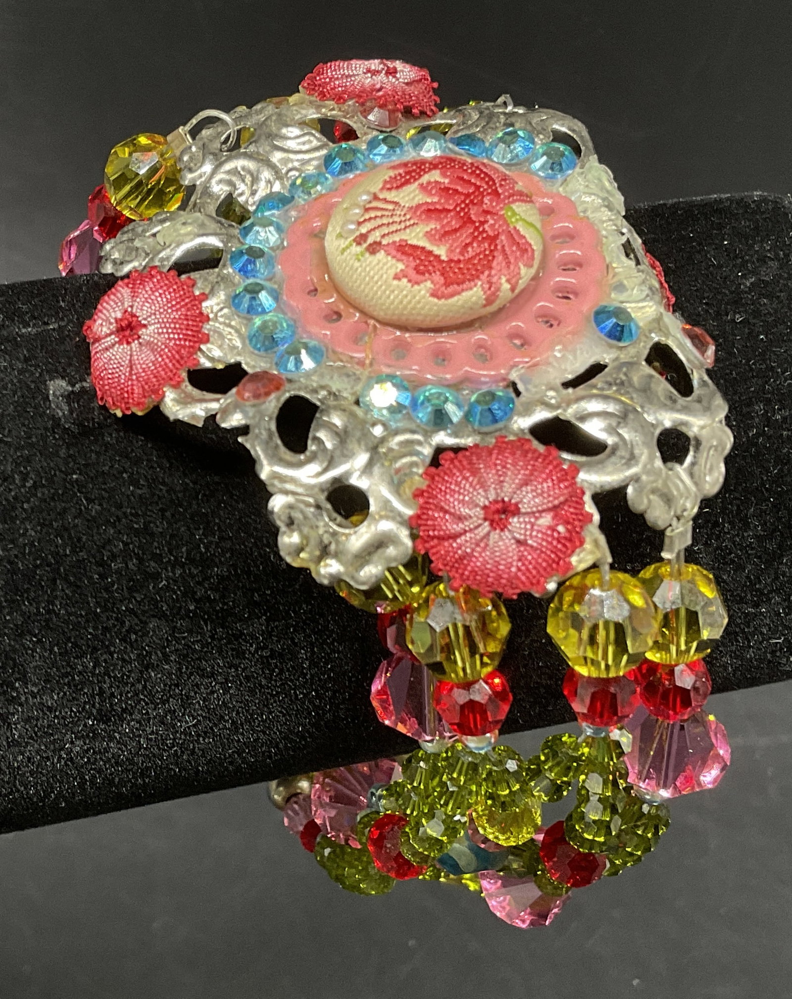 Victorian Rev Beaded Filigree Bracelet STER Clasp: Vintage Victorian Revival Beaded Filigree Bracelet. Pink floral button with pink trim and blue beads mounted on silver-toned filigree centerpiece. Sterling Silver clasp. Marked 925. Green, red, and
