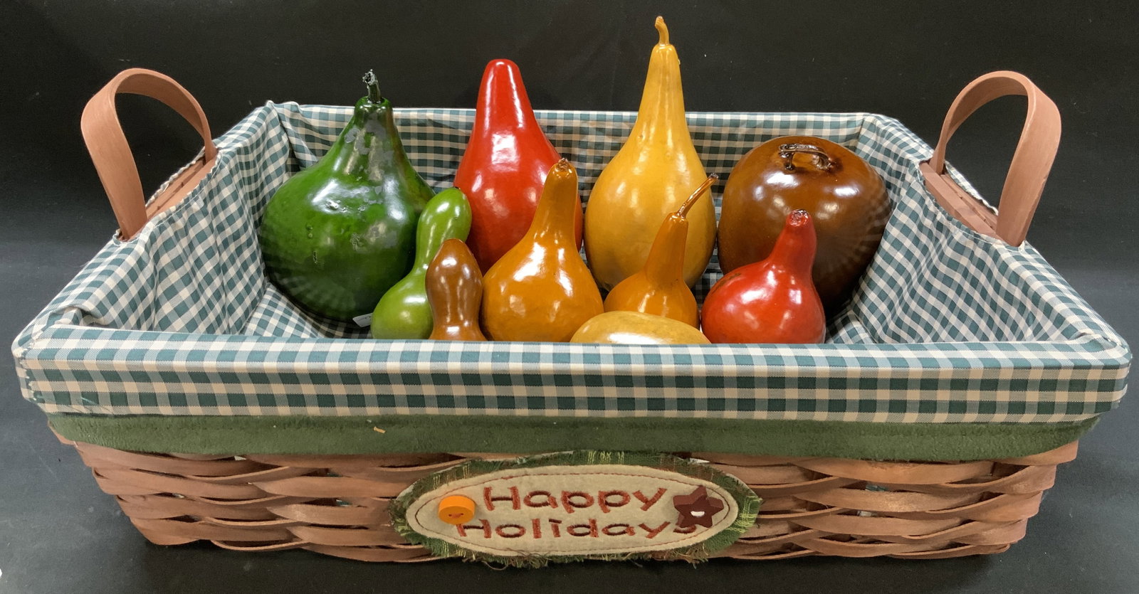 Lt11 Vtg Gingham Happy Holidays Basket Faux Fruit: Lot of 11 pieces vintage Gingham weaved basket with Happy holidays patch and 10 pcs of faux fruit including gourds, pears, peppers, all warm autumnal colors. Basket lined in green and white gingham fa