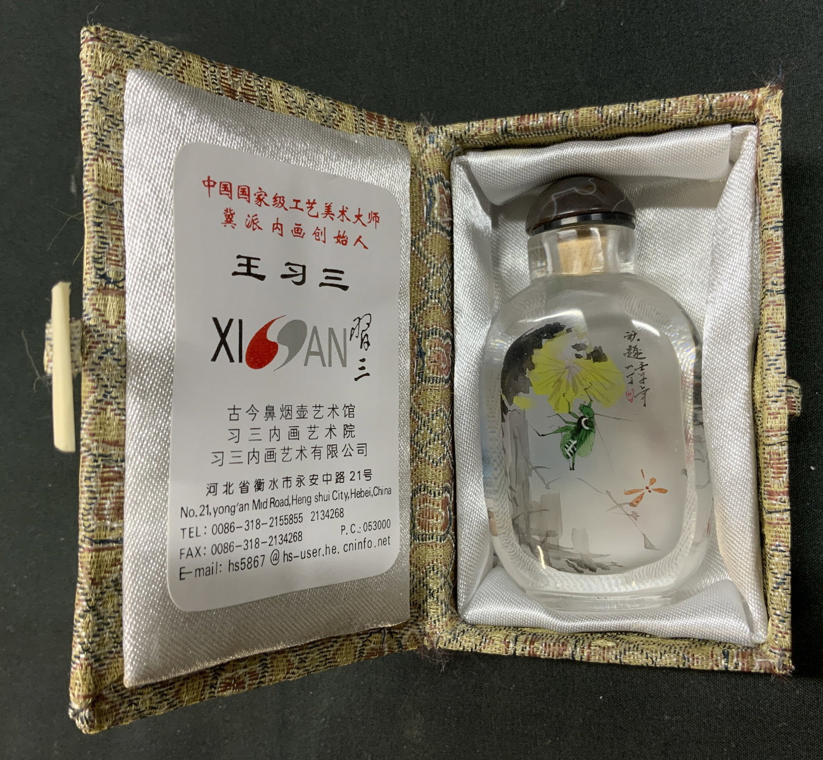 Vtg Chinese Wang Xisan Inside Painted Snuff Bottle: Vintage Chinese inside painted glass snuff bottle from the studio of master artist Wang Xisan. Green grasshopper resting on a yellow flower with a flying dragonfly. Reverse landscape scene with red be