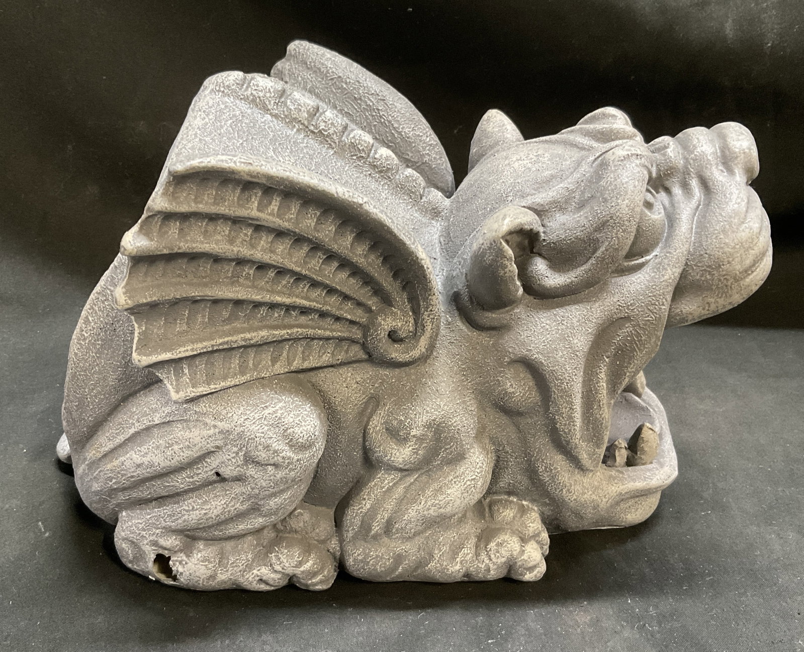 Design Toscano Roland the Gargoyle Rain Gutter: 2020 Design Toscano Roland the Gargoyle Rain Gutter. Cast-Resin material crushed with real stone. Slips at end of home gutter downspout. Water flows out of mouth when it rains and away from home. Hole
