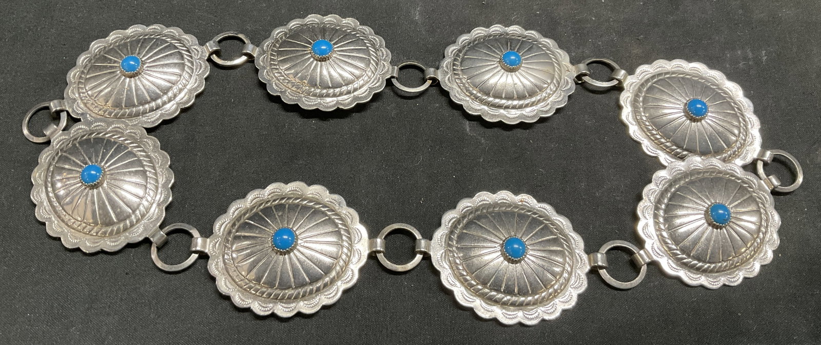 Western-Style Silver-Toned Concho Chain Belt: Western-Style Silver-Toned Scalloped Concho Chain Belt. Turquoise-Toned beads. Condition consistent with age and exposure. Measures approx 19.75in L. Western-Style, silver-toned, concho, belts,