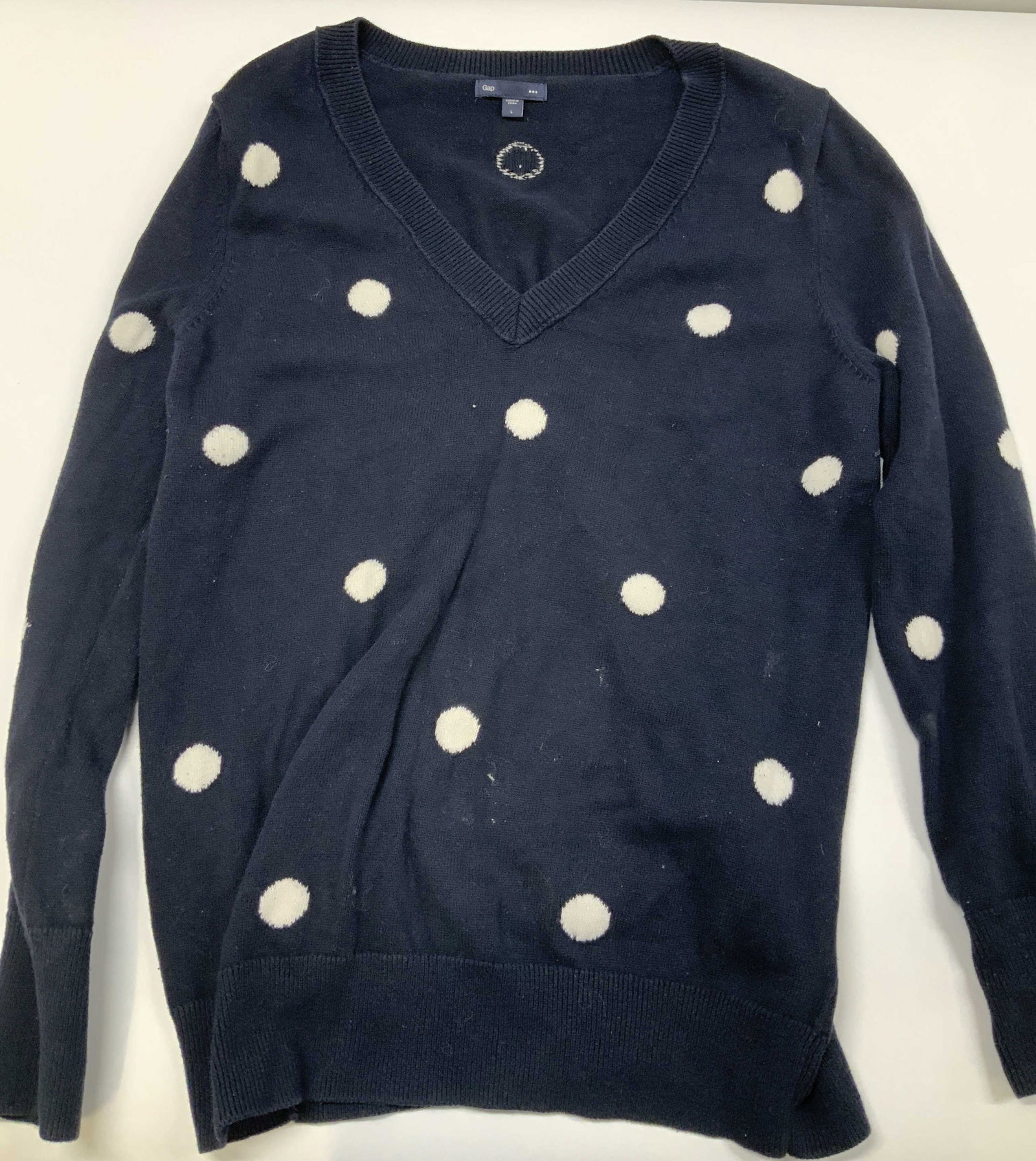 Gap navy blue polka dot sweater: Gap navy blue polka dot sweater. Features v neck neckline, ribbed collar, cuffs and hemline, and a large polka dot pattern. Made for the Gap fall line of 2013 in size large. -11H