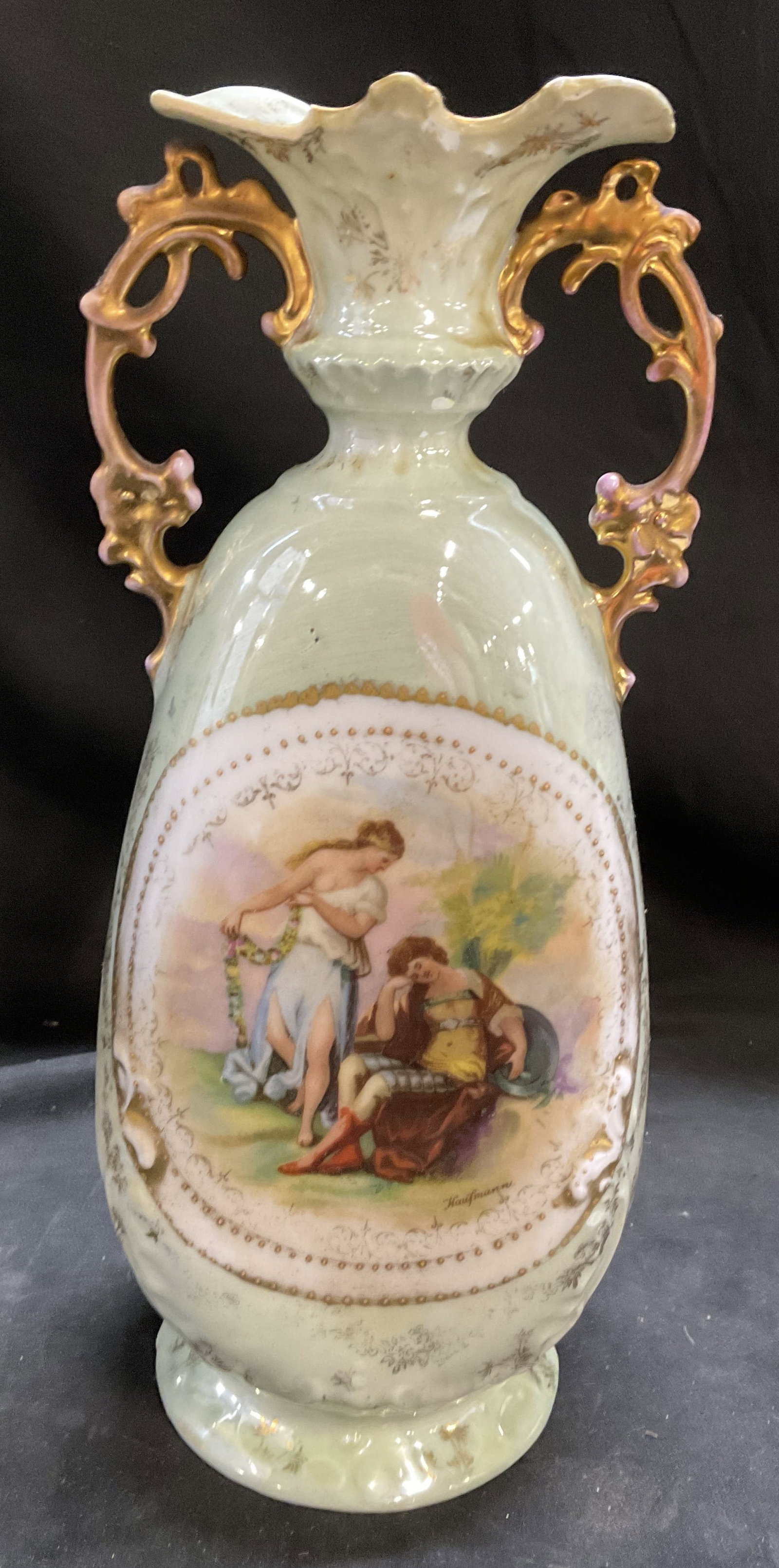 ANTQ Victoria Carlsbad Porc Urn Vase AUSTRIA: Antique Victoria Carlsbad Porcelain Double-Handled Urn Vase. Austria. Light green glaze. Gilt accents. Neoclassical courting scene transfer on center medallion styled after the works of artist Kaufman