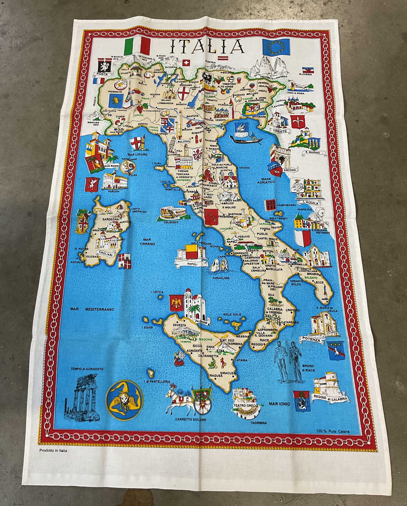 Vtg Italian Map Souvenir Cotton Tea Towel Italy: Vintage Italian map souvenir cotton tea towel. Made in Italy. 100% pure cotton. Regional landmarks and motif illustrations. Chain link border. Reads Italia at the top. Varying colors. Measures approx