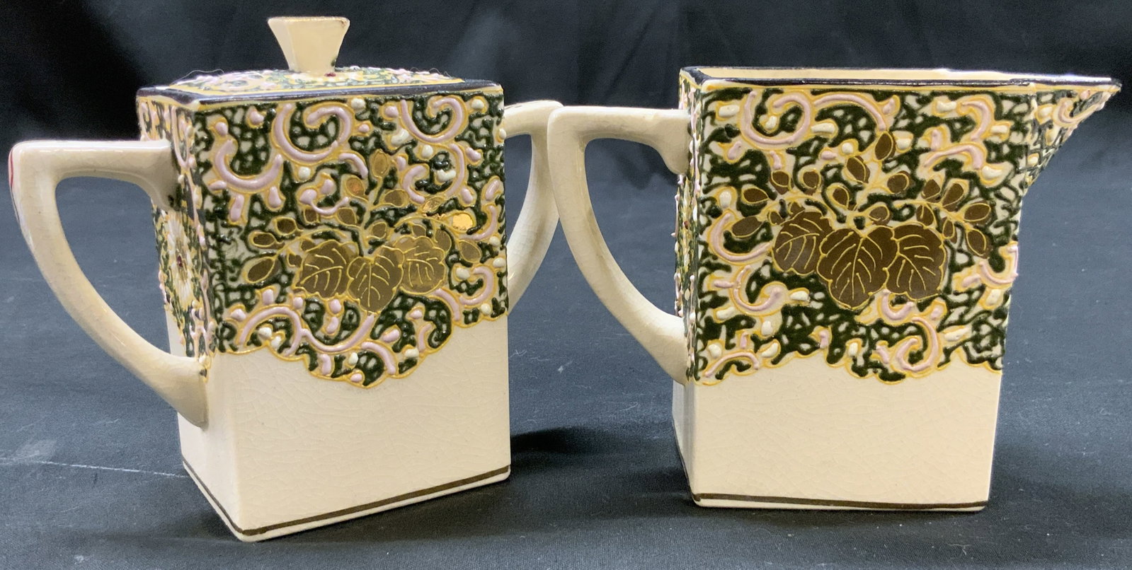 Vtg Moriage Square Cream & Sugar Set, Japan: Vintage porcelain creamer and lidded sugar bowl set. Geometric square column design, heavily embellished traditional hand painted Moriage detailing , raised pink scrollwork, green leaves, and oak leaf
