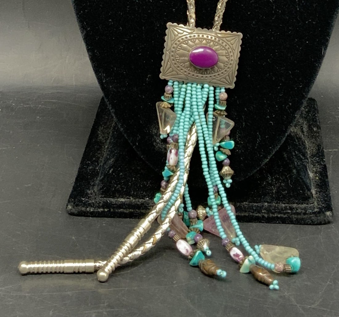 Vtg Sterling Silver Southwestern Tassel Necklace: Vintage Sterling Silver Southwestern Multi-Strand Bolo-Style Tassel Necklace. Marked Sterling with TK brand mark. Inspired by Native American jewelry designs. Woven braid chain that mimics leather cor