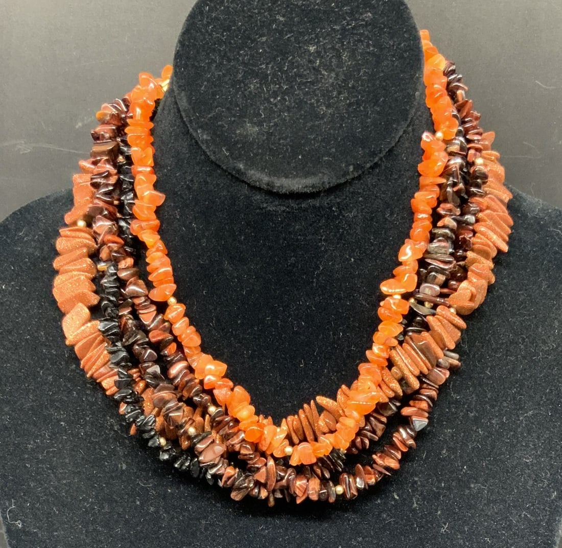 Multi-Strand Gemstone Chip Necklace GF Clasp: Multi-Strand Gemstone Chip Necklace With Gold-Filled Clasp. Marked 1/20 12KT G.F. Appears to be Brown Goldstone, Agate, Tigers Eye, and Obsidian. Comes with a red velvet Cecile et Jeanne Paris storage