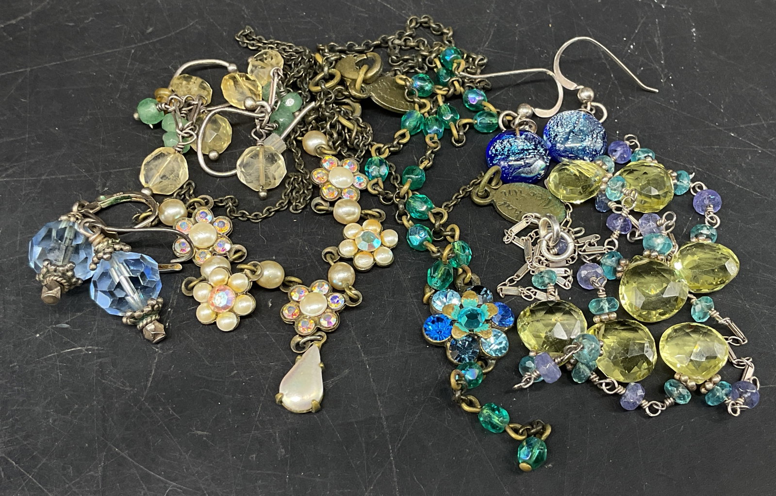 Lt7PC Vtg Necklaces Earrings Michael Negrin Ster+: 7 Pieces of Crystal And Beaded Jewelry. 2 Vintage Michael Negrin Swarovski Crystal necklaces from Israel, one white florals and one blue florals. Glass blue and green beaded necklace on sterling silve