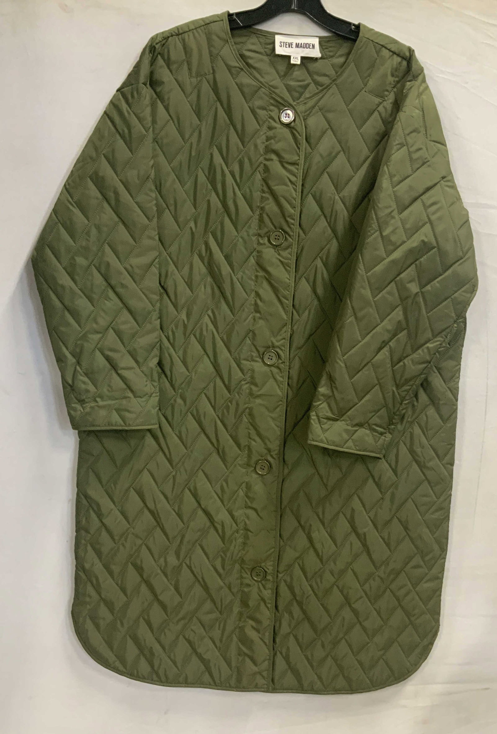 Steve Madden Emerson Longline Quilted Coat: Steve Madden Emerson Longline Quilted Coat. Made of 100% polyester in size XXL. It features an Oversized relaxed fit with a longline drop, providing excellent coverage. It features a unique geometric 