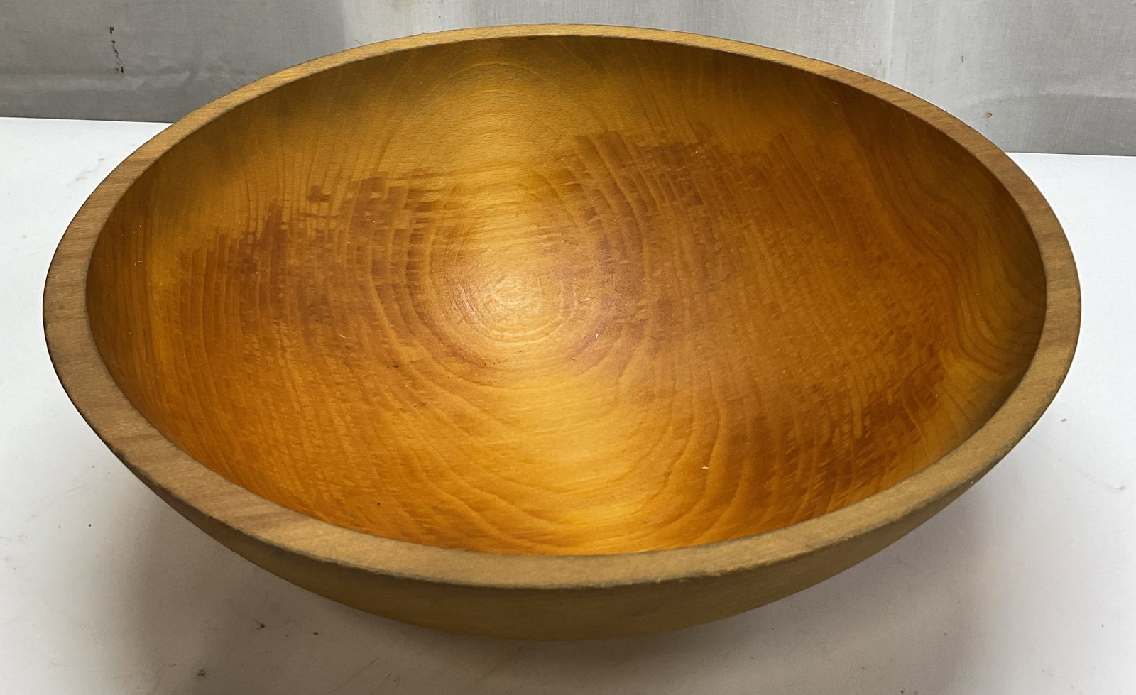 Vintage Hand Made Wooden Serving Bowl: Vintage hand made wooden serving bowl. Wide round shape. Measures ht approx 4.5 inches diam approx 14 inches. Scratching. Serving bowl, wooden bowl, home decor, decor, home accessories, antiques,