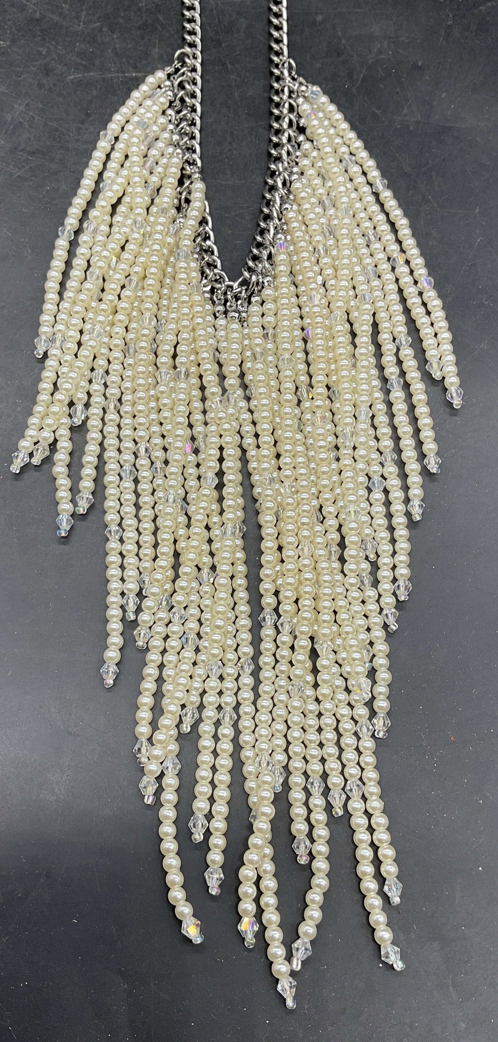 Vintage Faux Pearl Crystal Fringe Necklace: Vintage silver tone necklace with faux pearl and crystal beaded fringe. Drop length measures approx. 12.5 inches. Some scratching. Jewelry, estate jewelry, costume jewelry, cocktail jewelry, fashion j